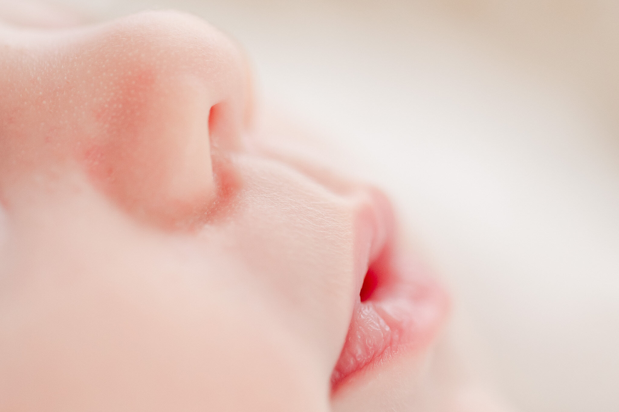 Macro image of newborn baby lips in 
