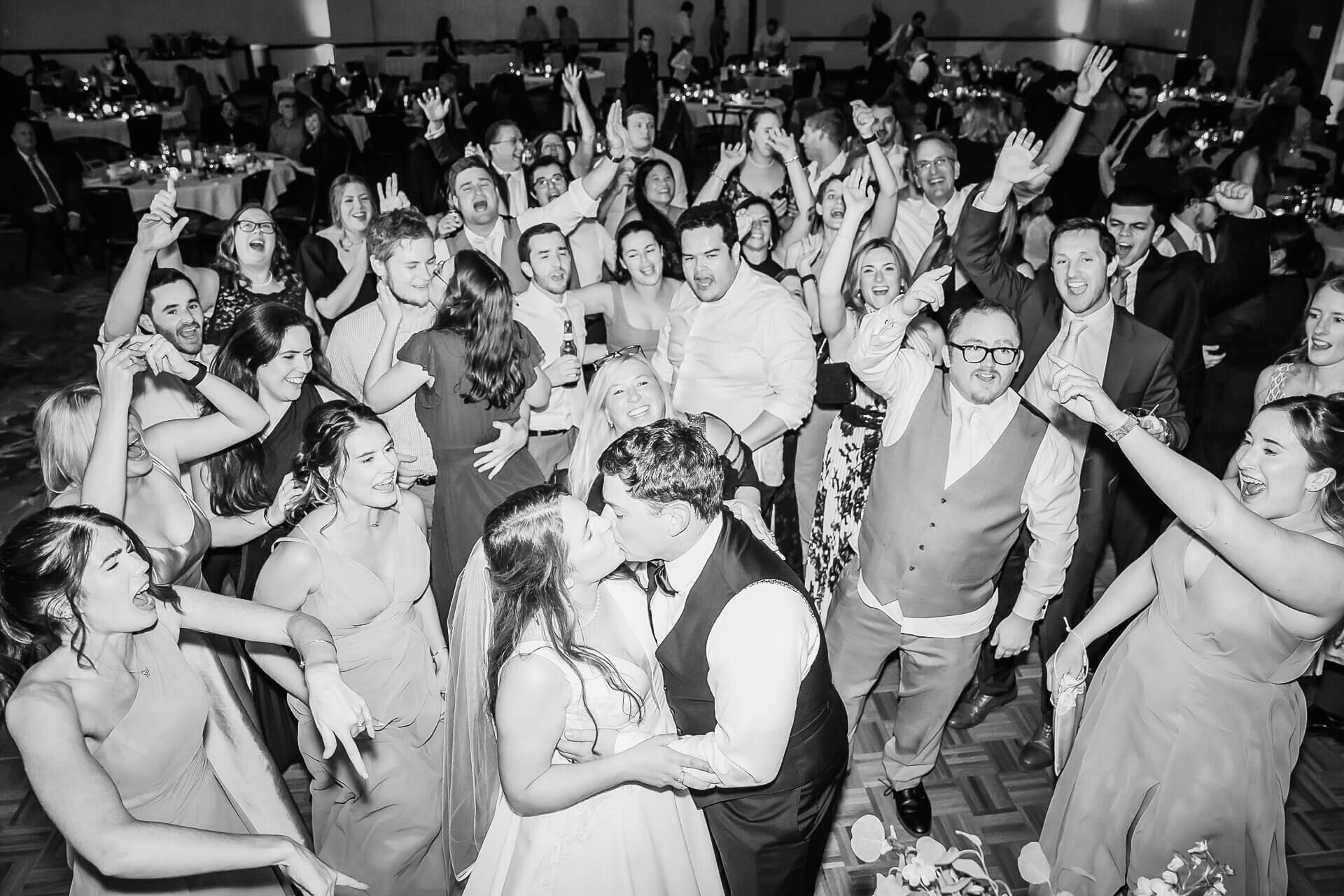 Binghamton-Wedding-Photographer-Tioga-Downs-Casino-Kiss-Party-Dance