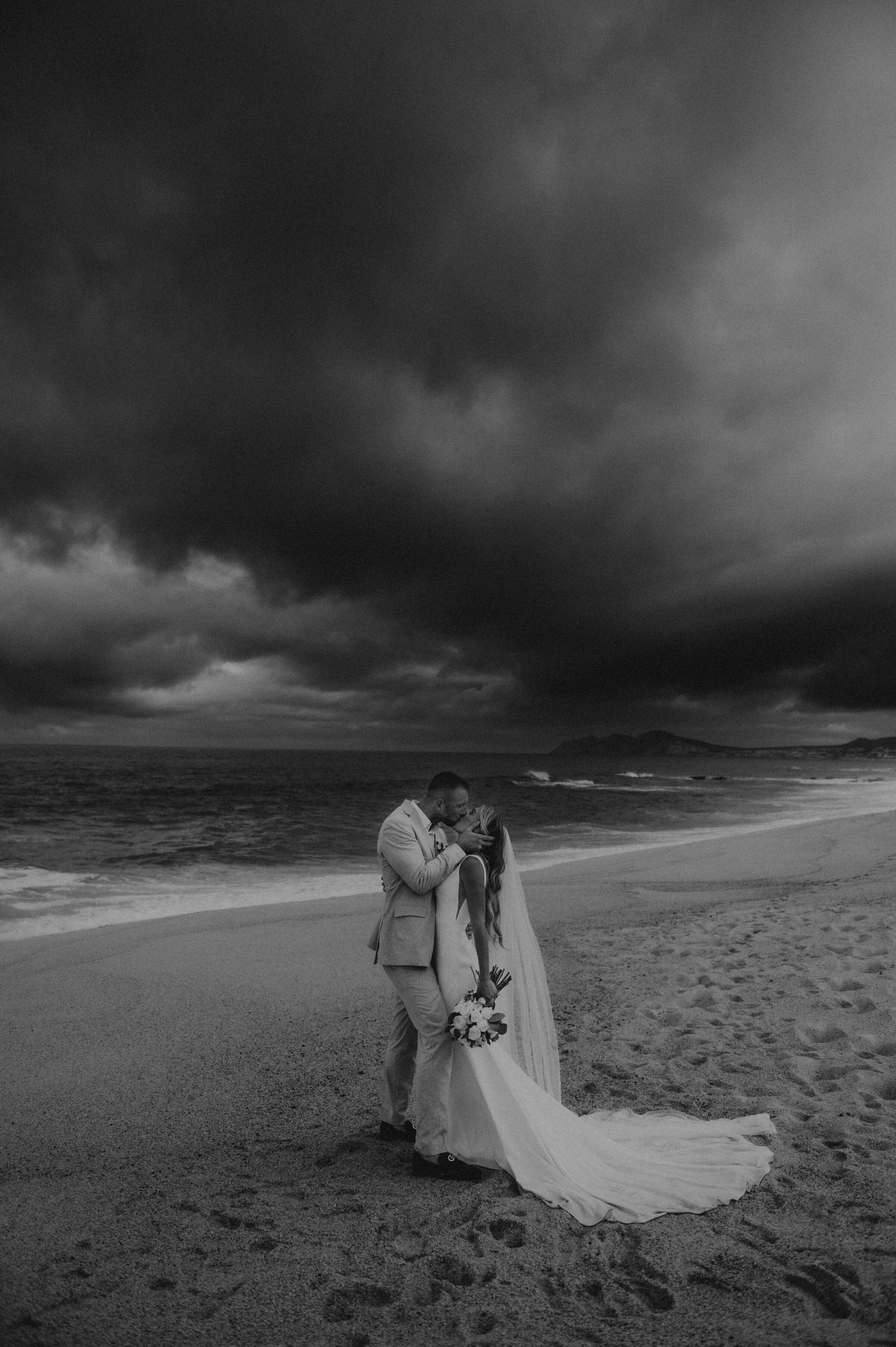 couple kissing in Cabo San Lucas  Mexico, destination wedding, cinematic film & Super 8