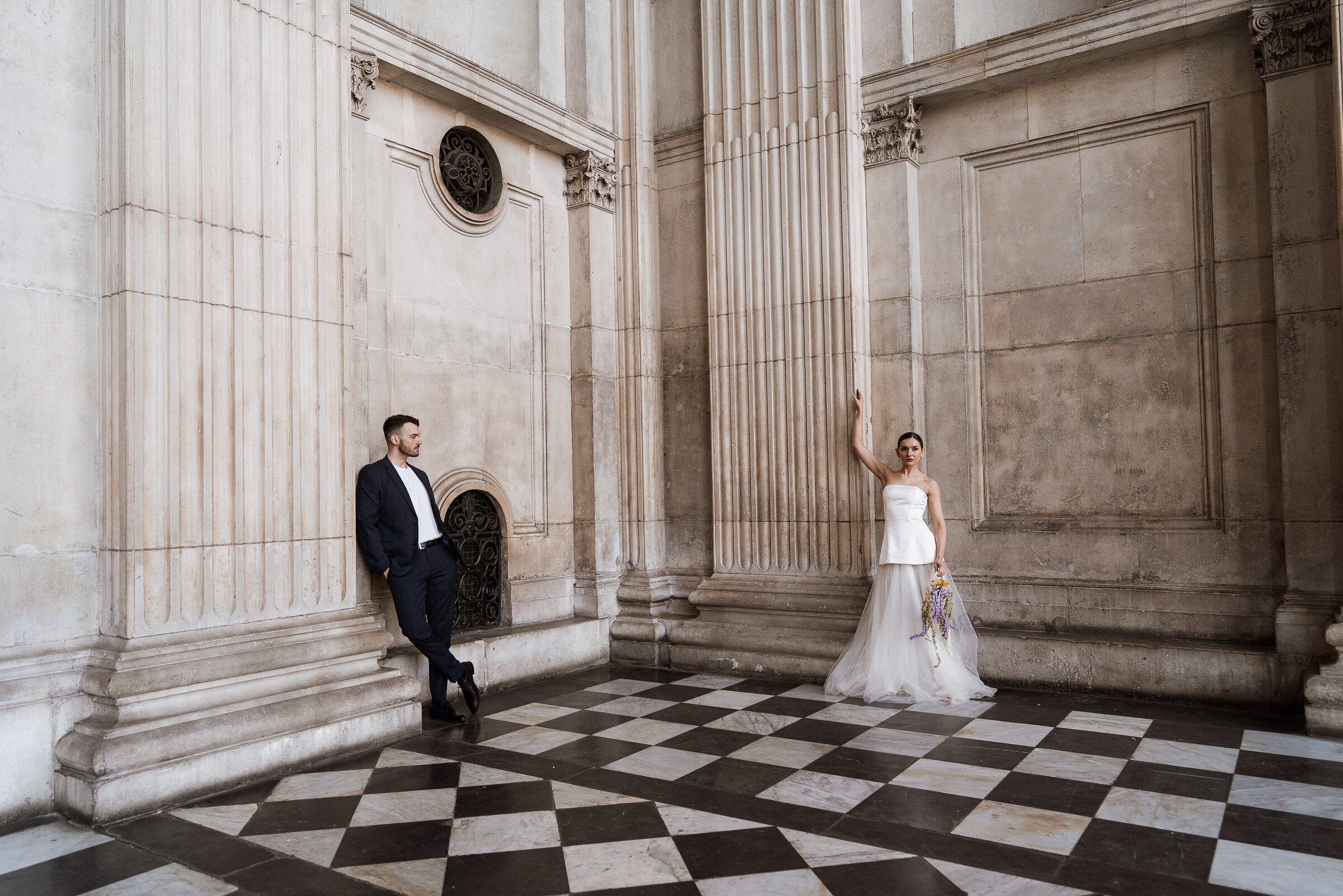 editorial London wedding image of couple standing apart at St Pauls Cathedral 