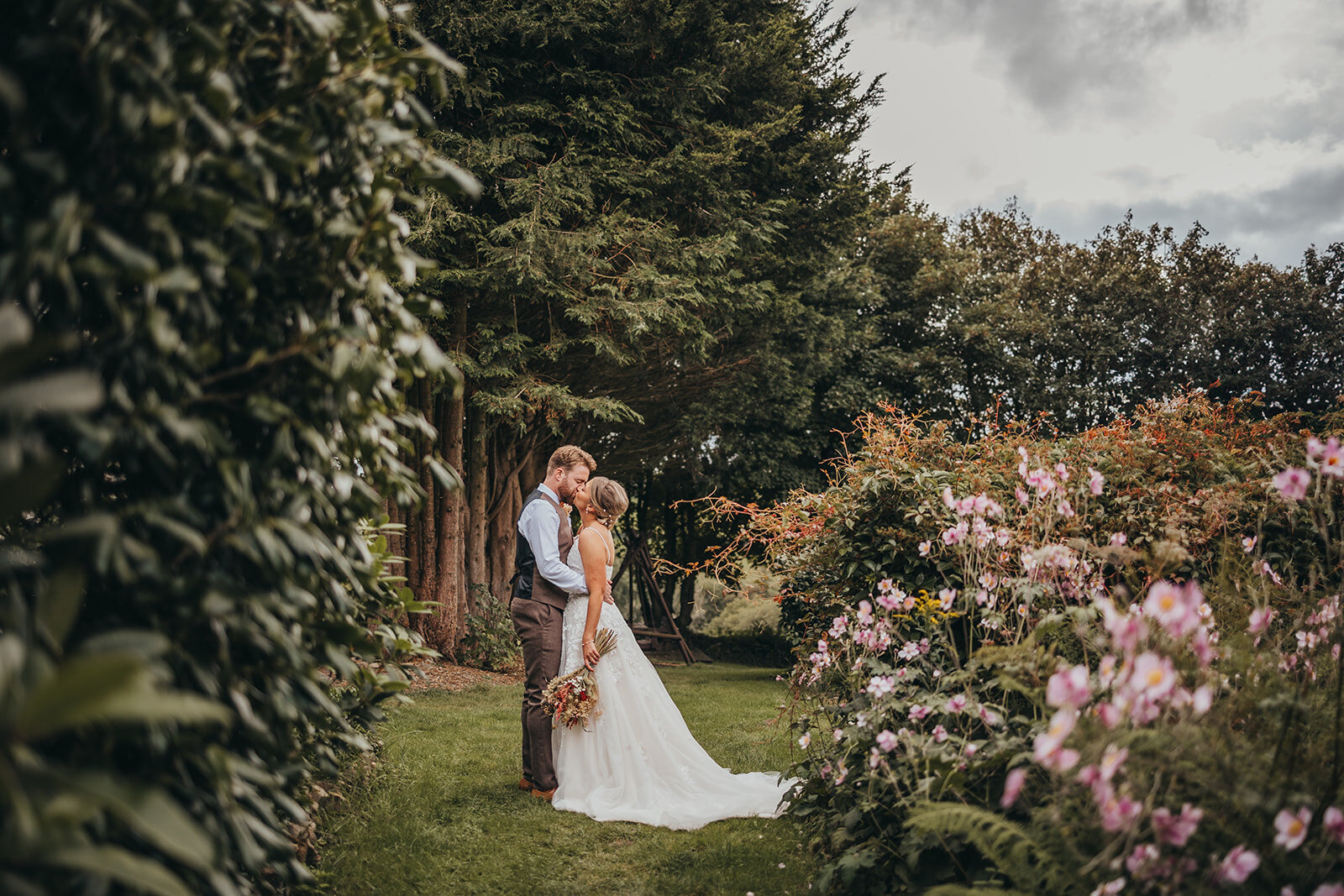 couple kiss in forest