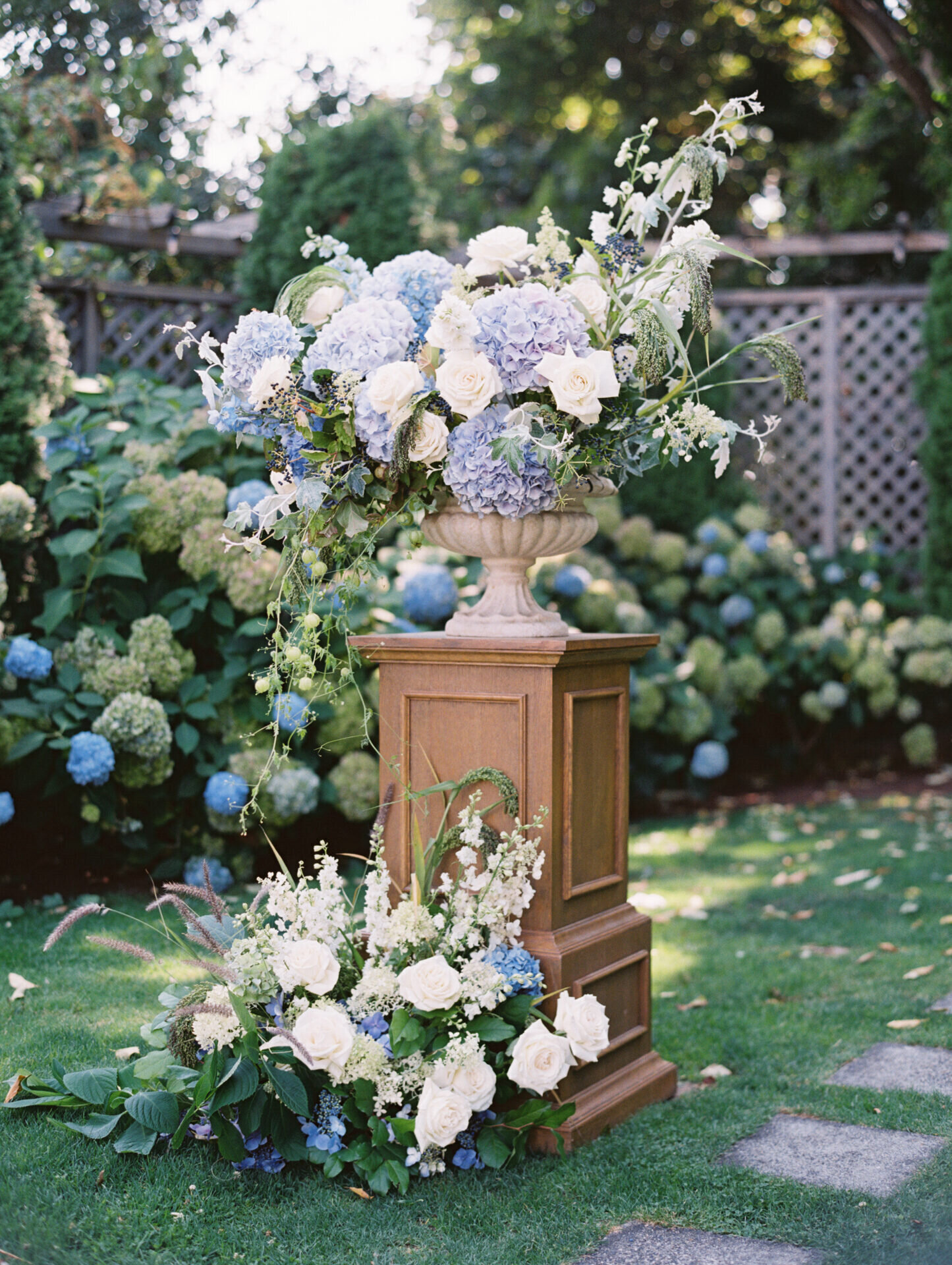 blue purple and white floral arrangement for wedding ceremony in seattle