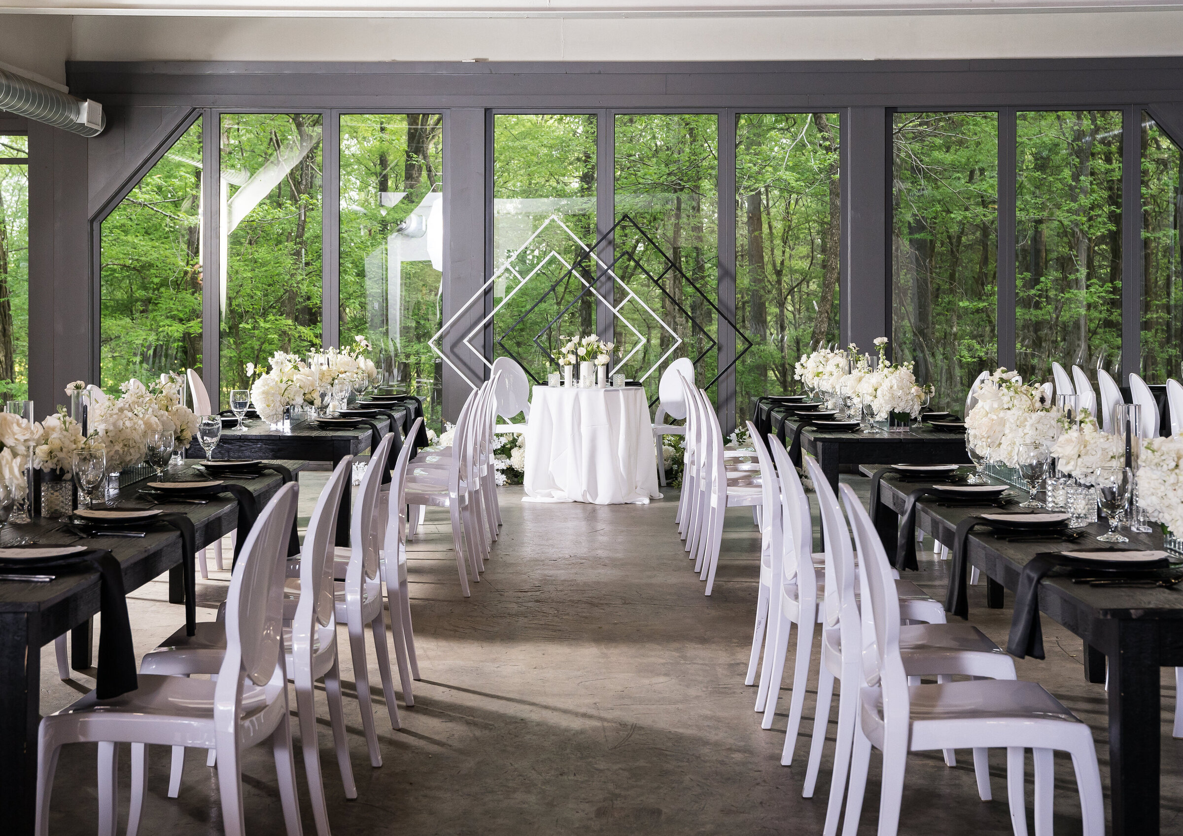 Modern black and white wedding design with statement floral installations in Memphis