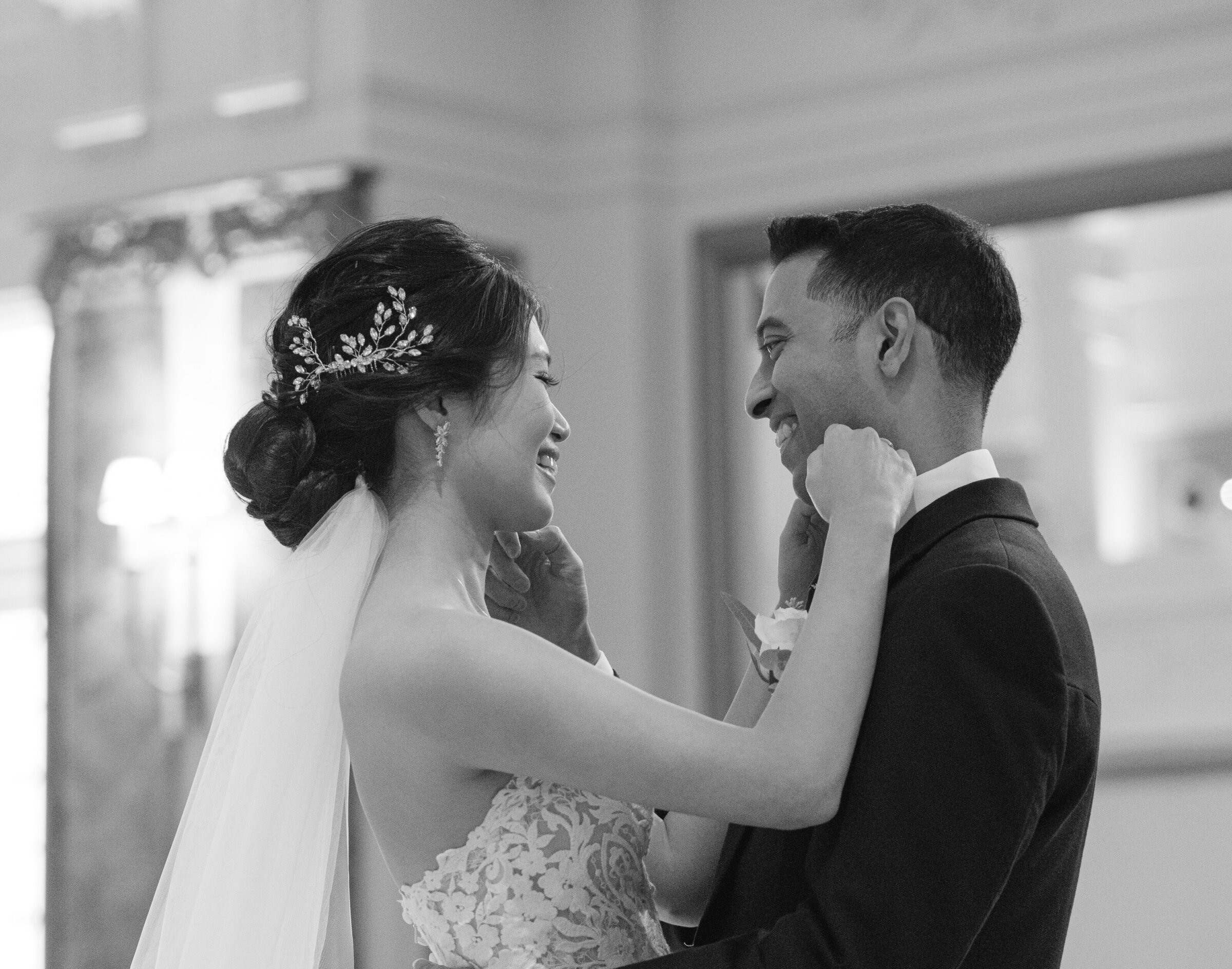 Joyful bride and groom sharing their first dance at Kimpton Fitzroy Hotel London – emotional multicultural wedding by Chiramos Photography