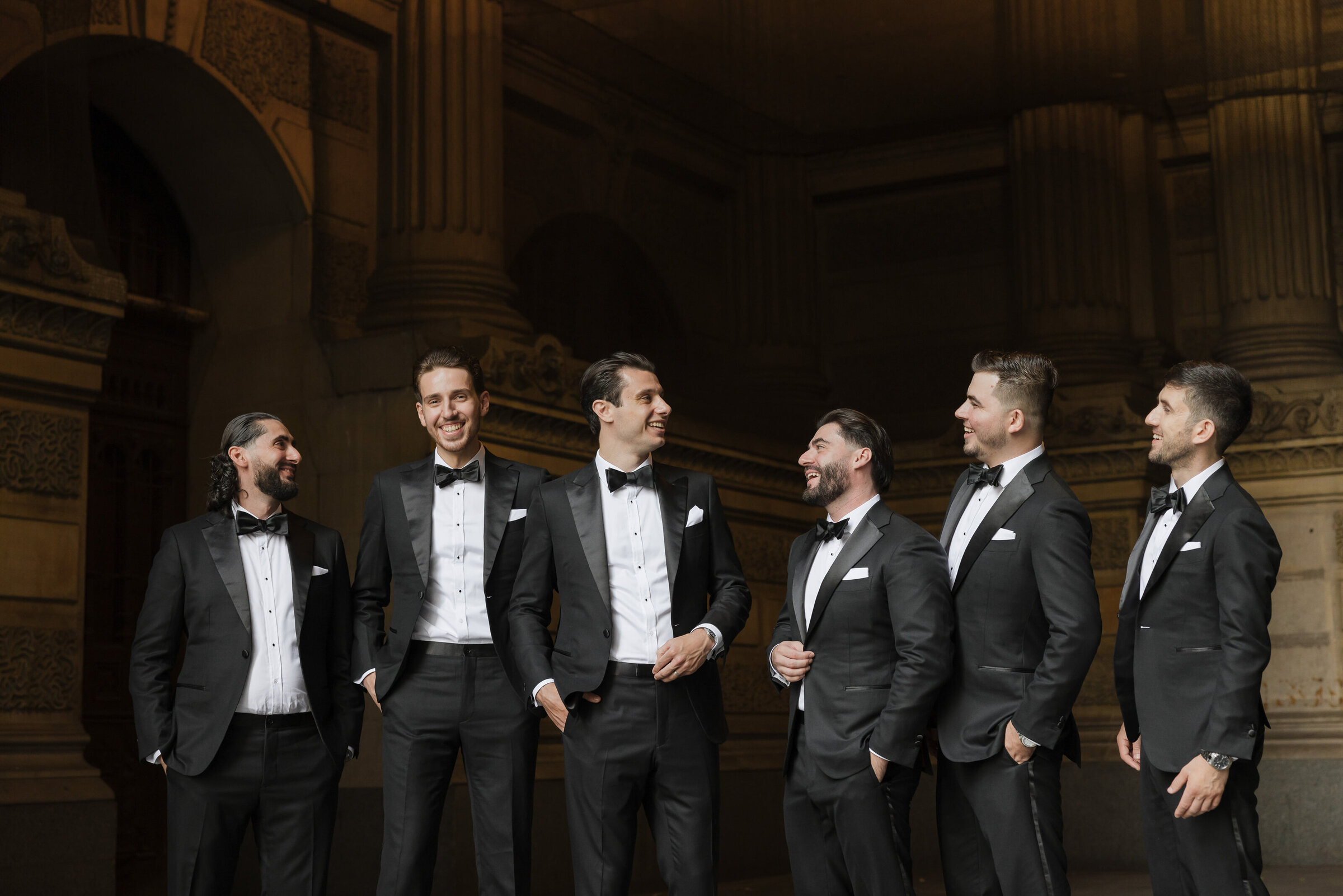 groomsmen-city-hall-philly-candid-portrait