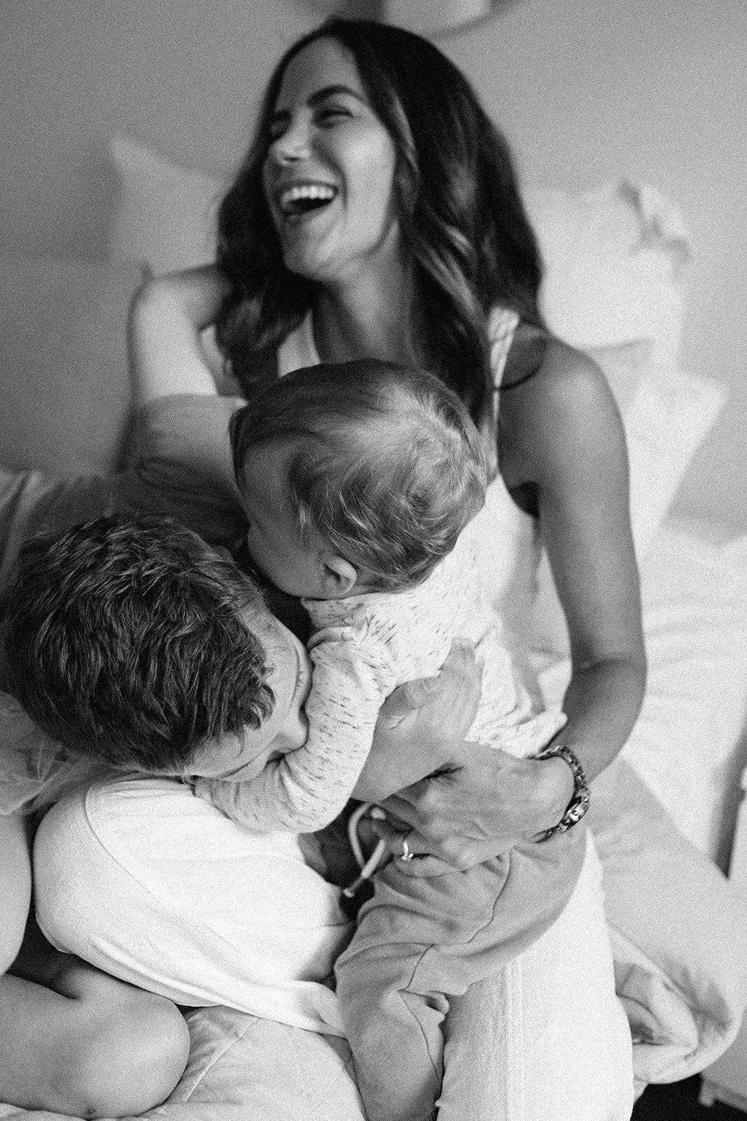 relaxed in home family photos with mum laughing