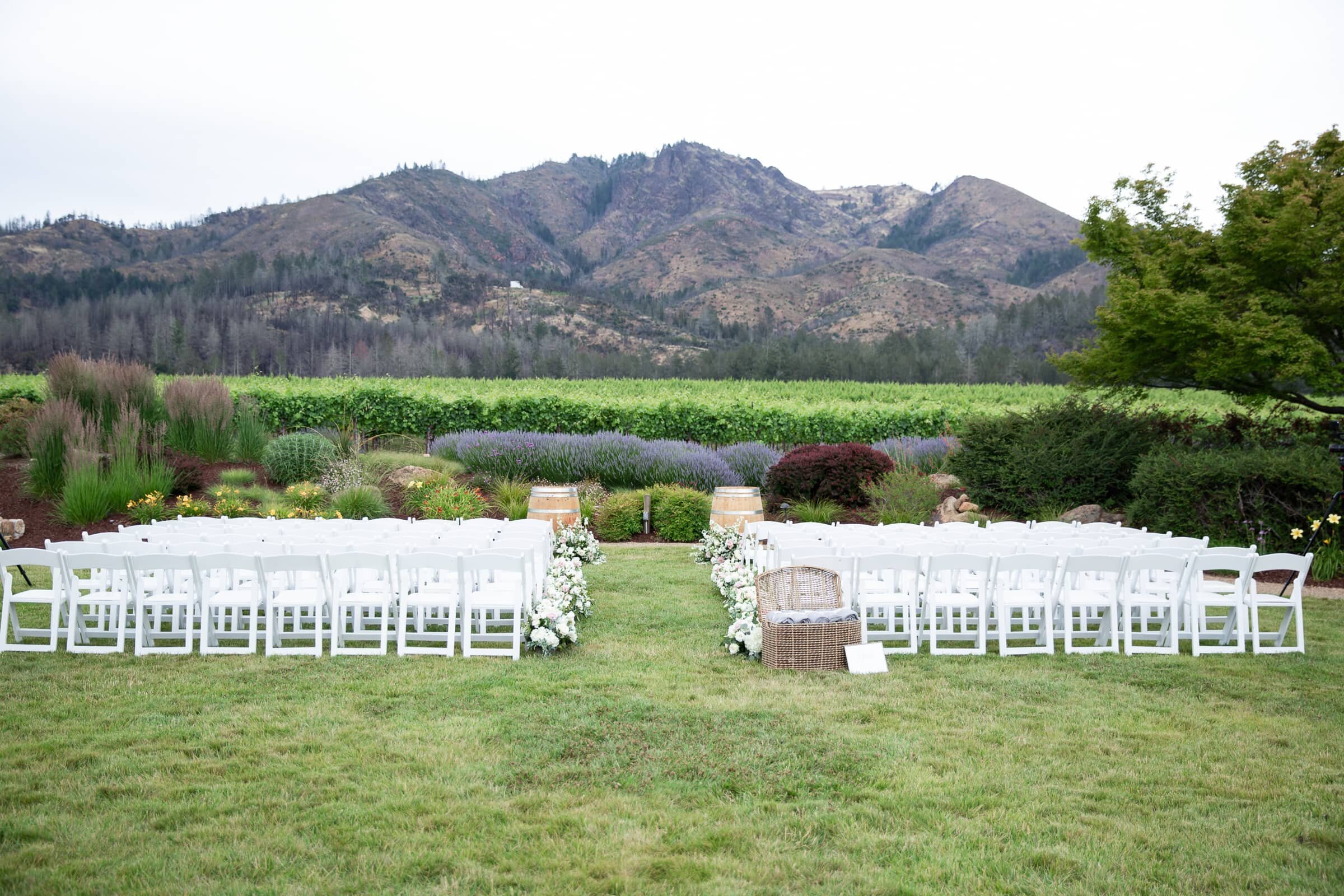 destination wedding at the sonoma county winery. Ceremony setup against mountain views.