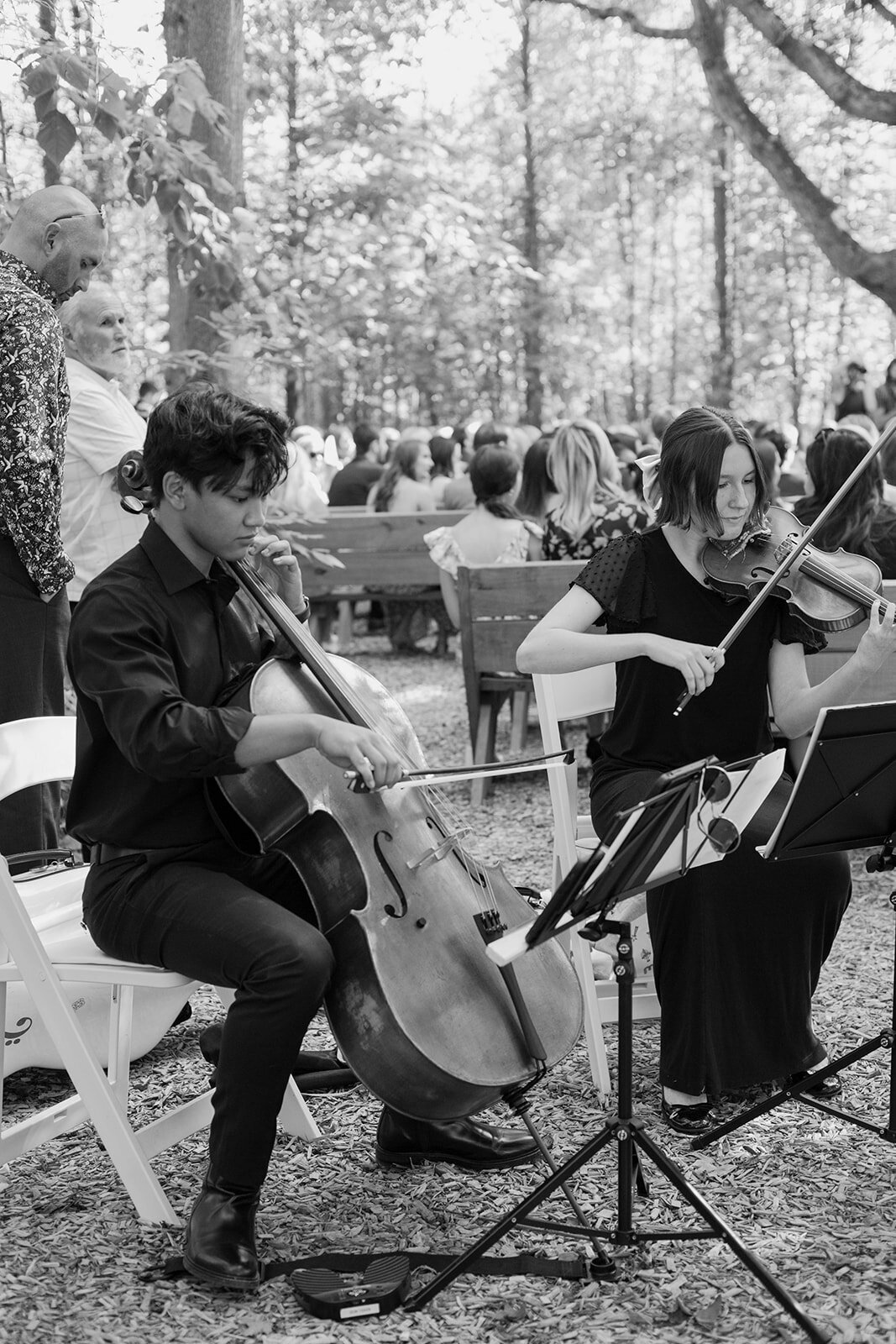 Live musicians performing during the wedding ceremony, adding a beautiful and soulful touch to the celebration in Columbus, OH.