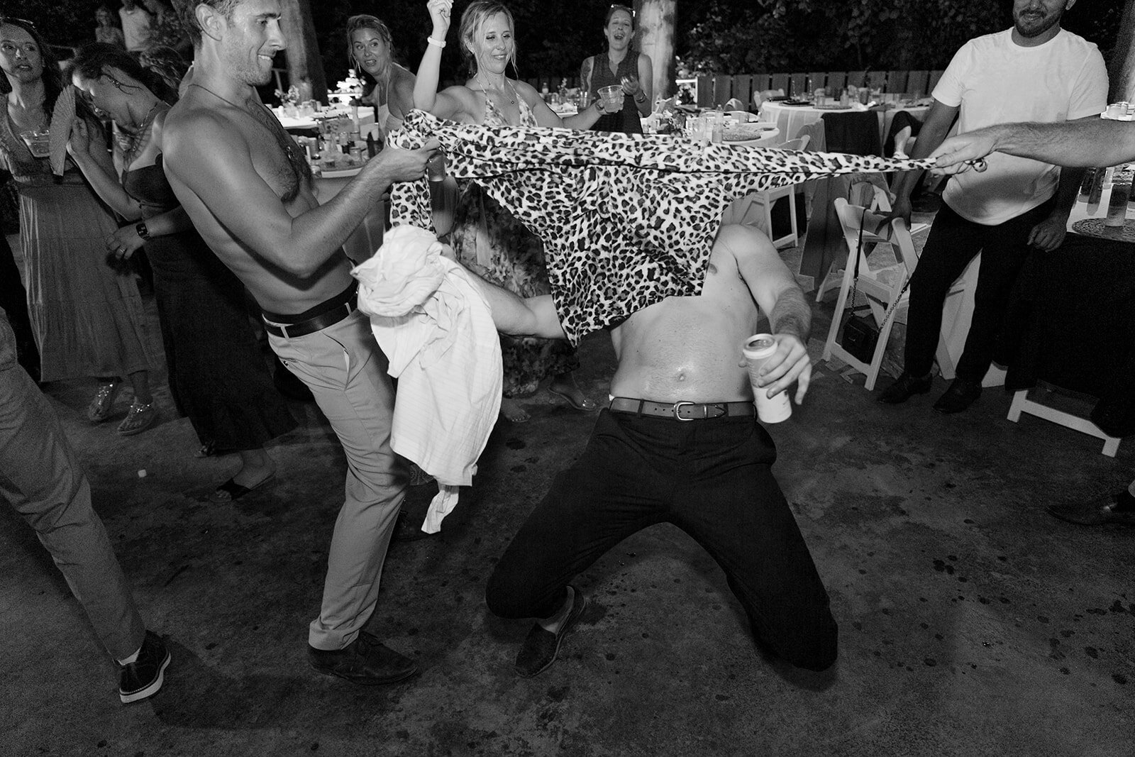 Limbo line formed at a wedding reception.