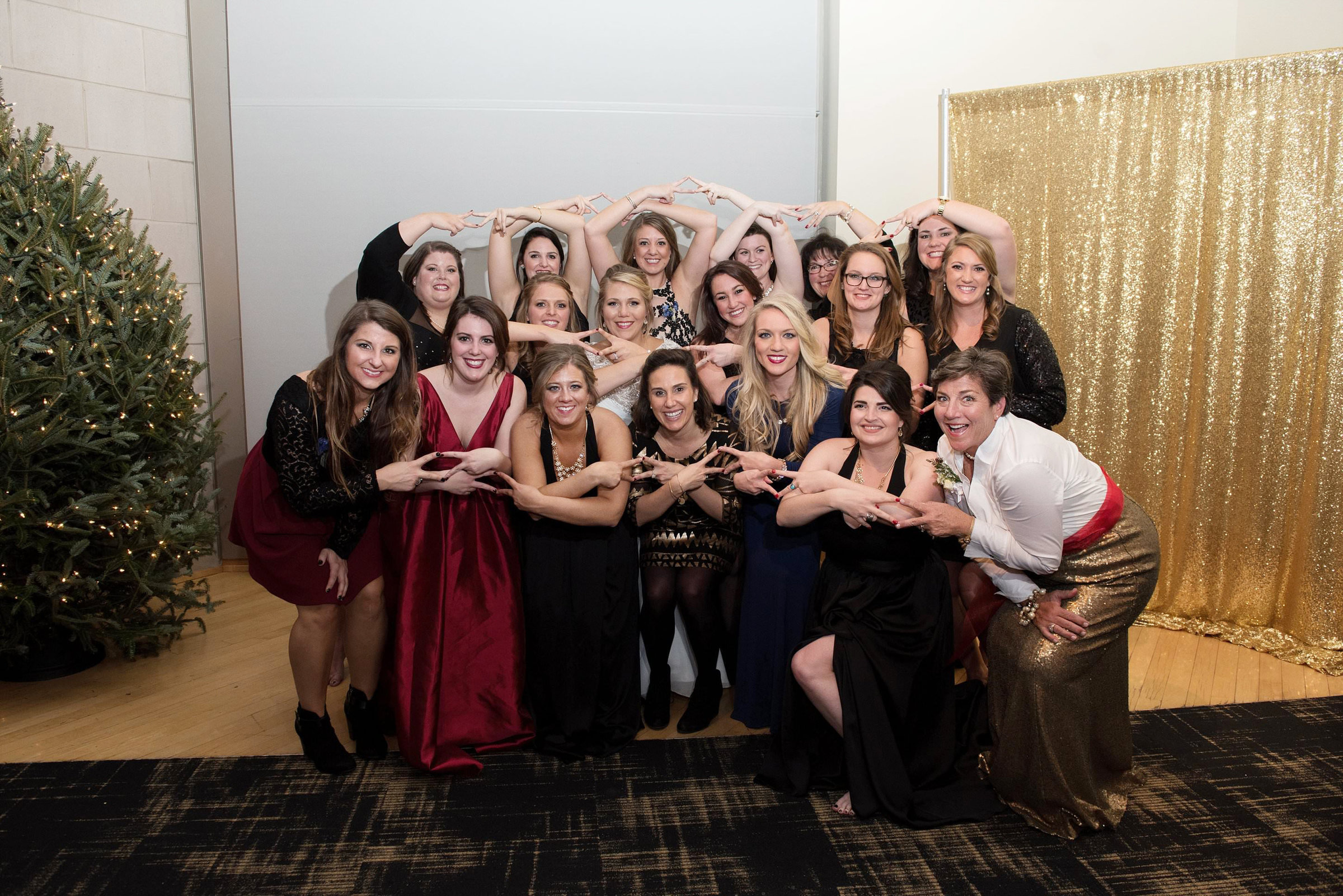 Group photo of Alpha Delta Pi generation sorority photo at brides wedding reception