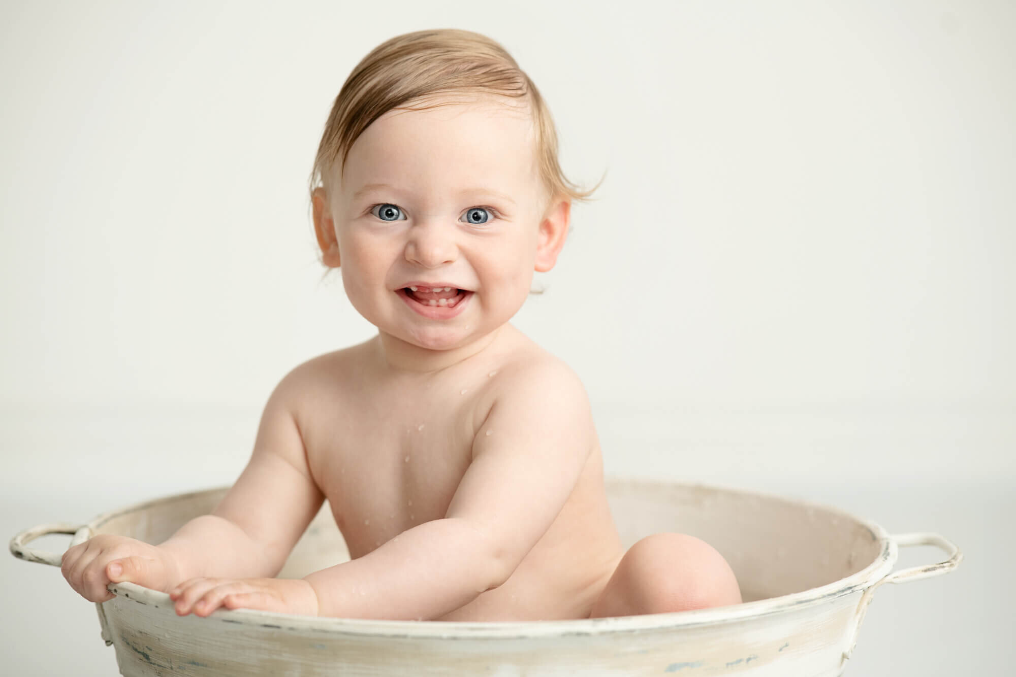 Baby boy in vintage tub