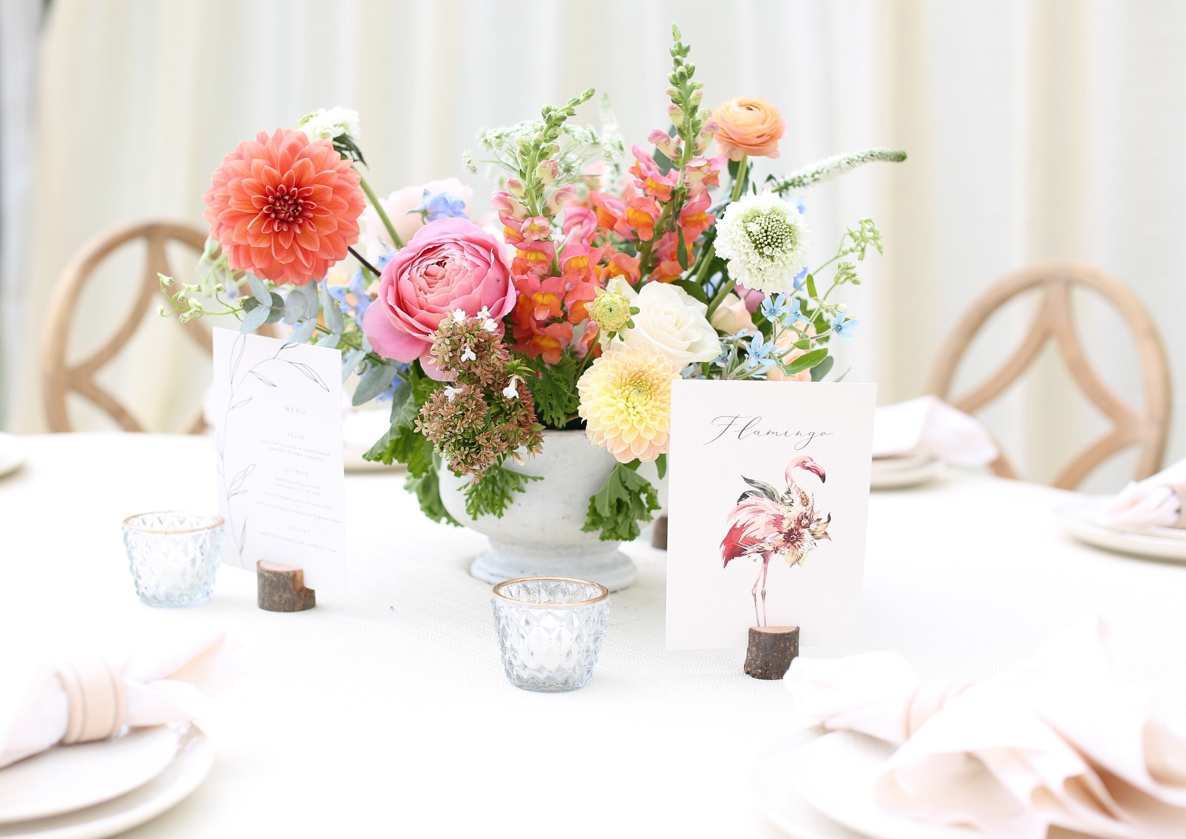 spring orange, yellow and pink  flower arrangement during carolina inn wedding