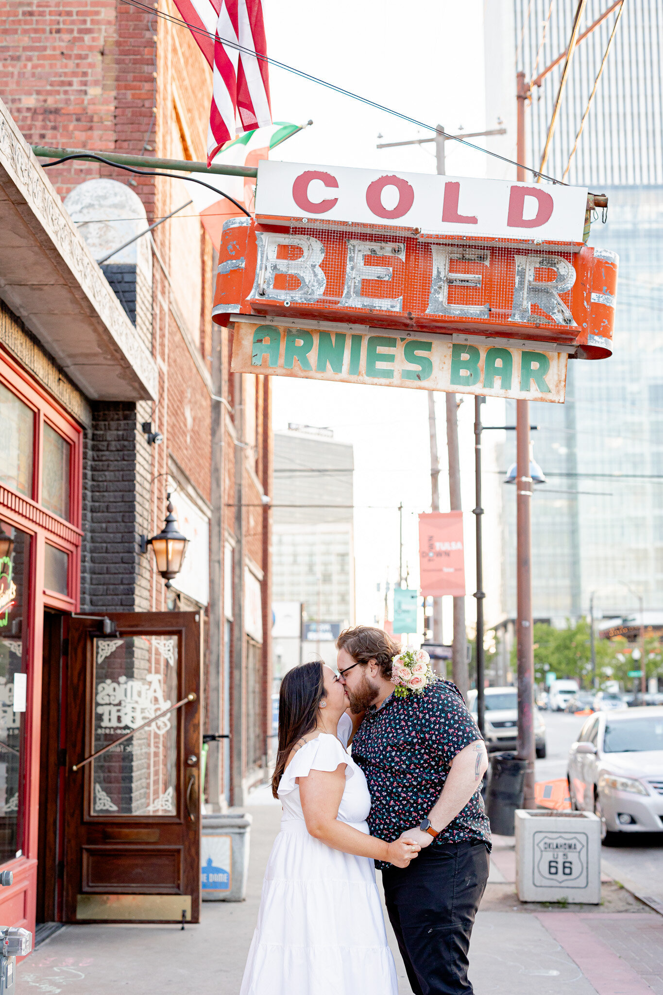 Engagement session at blue dome district bar Arnies Bar  in Tulsa Oklahoma | downtown Tulsa engagement session at a bar