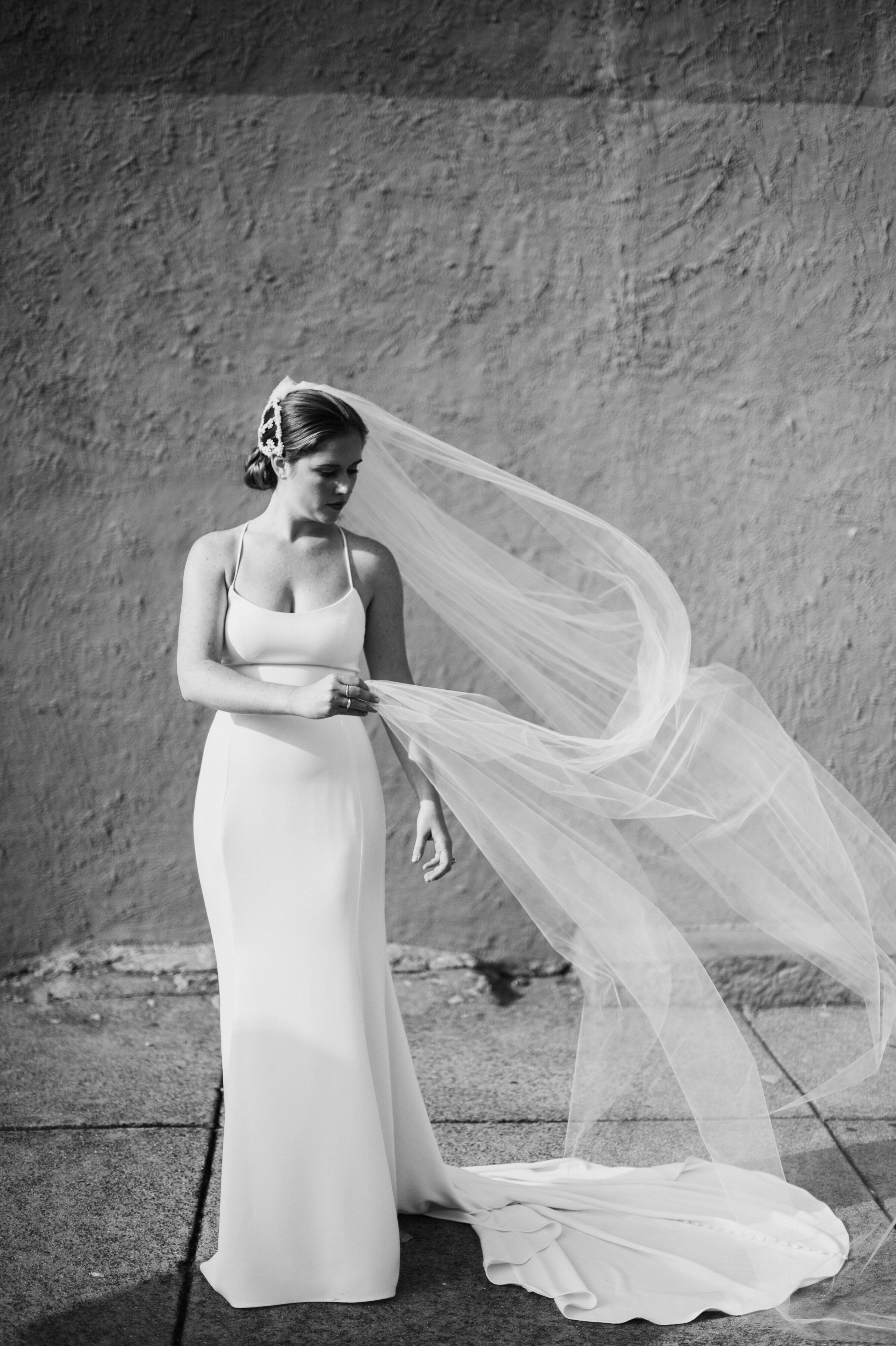 Bride with flowing veil.