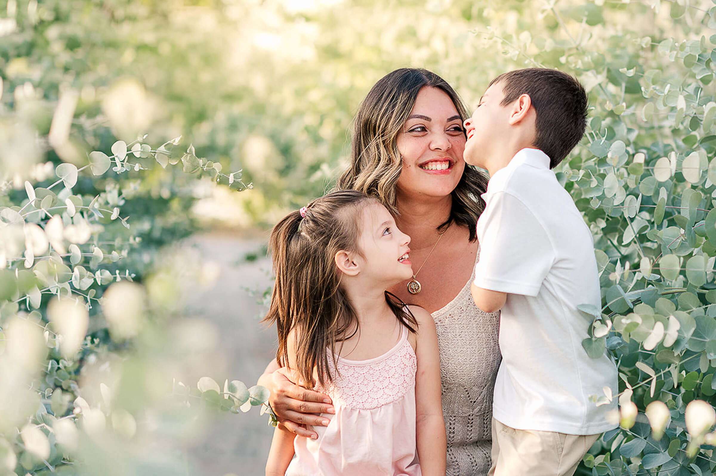 Mom and children laughing during a mini session in York, PA
