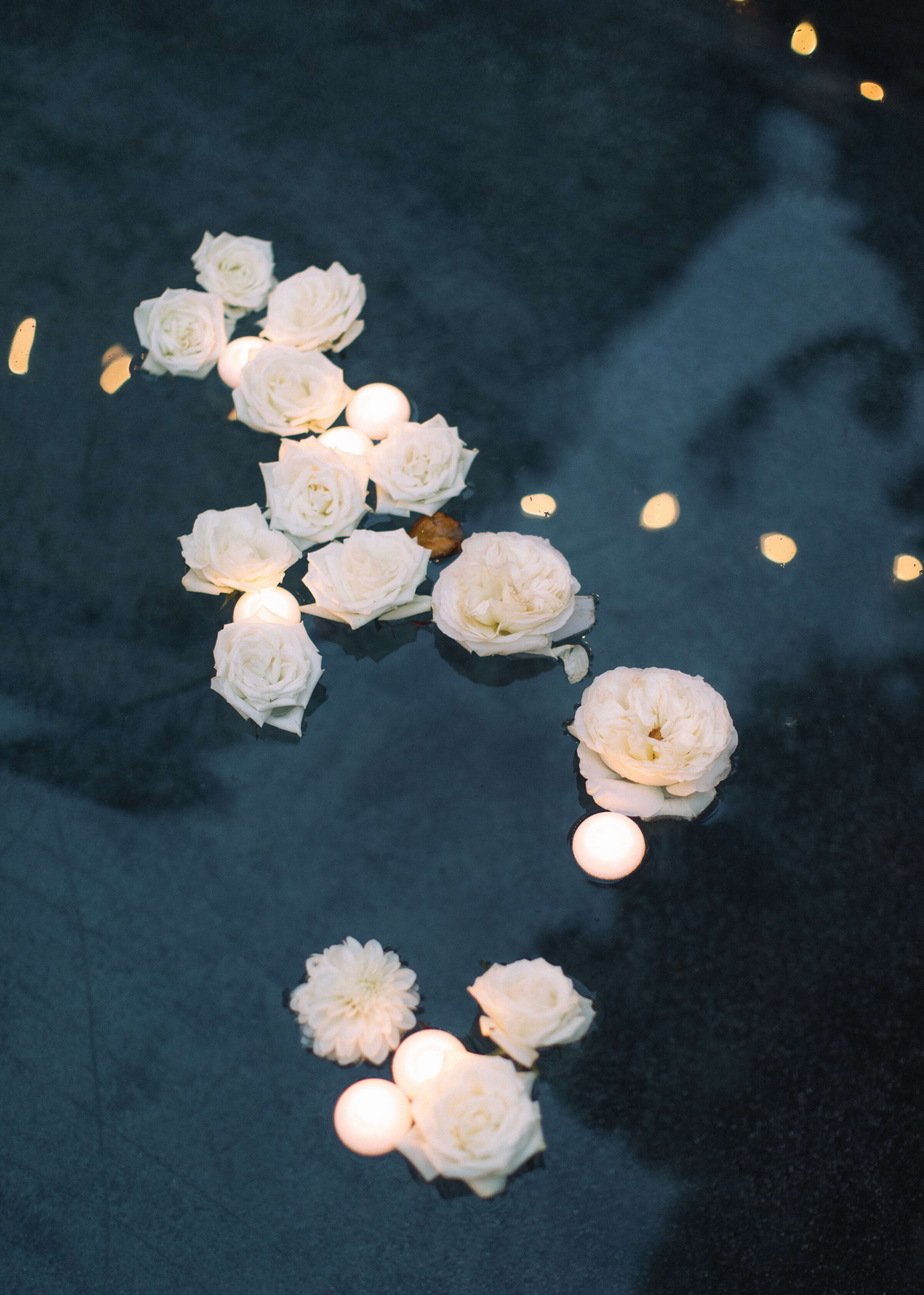 maeve-matt-flowers-floating-in-pool-springvale-floral