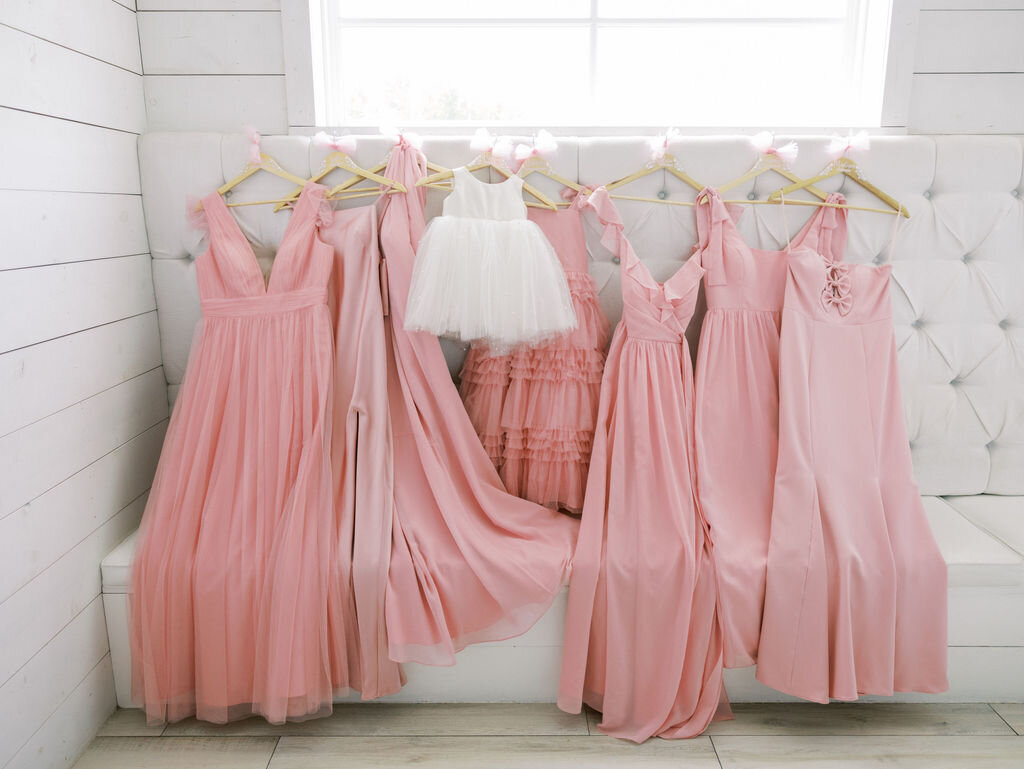 Pink bridesmaids dresses in bridal suite