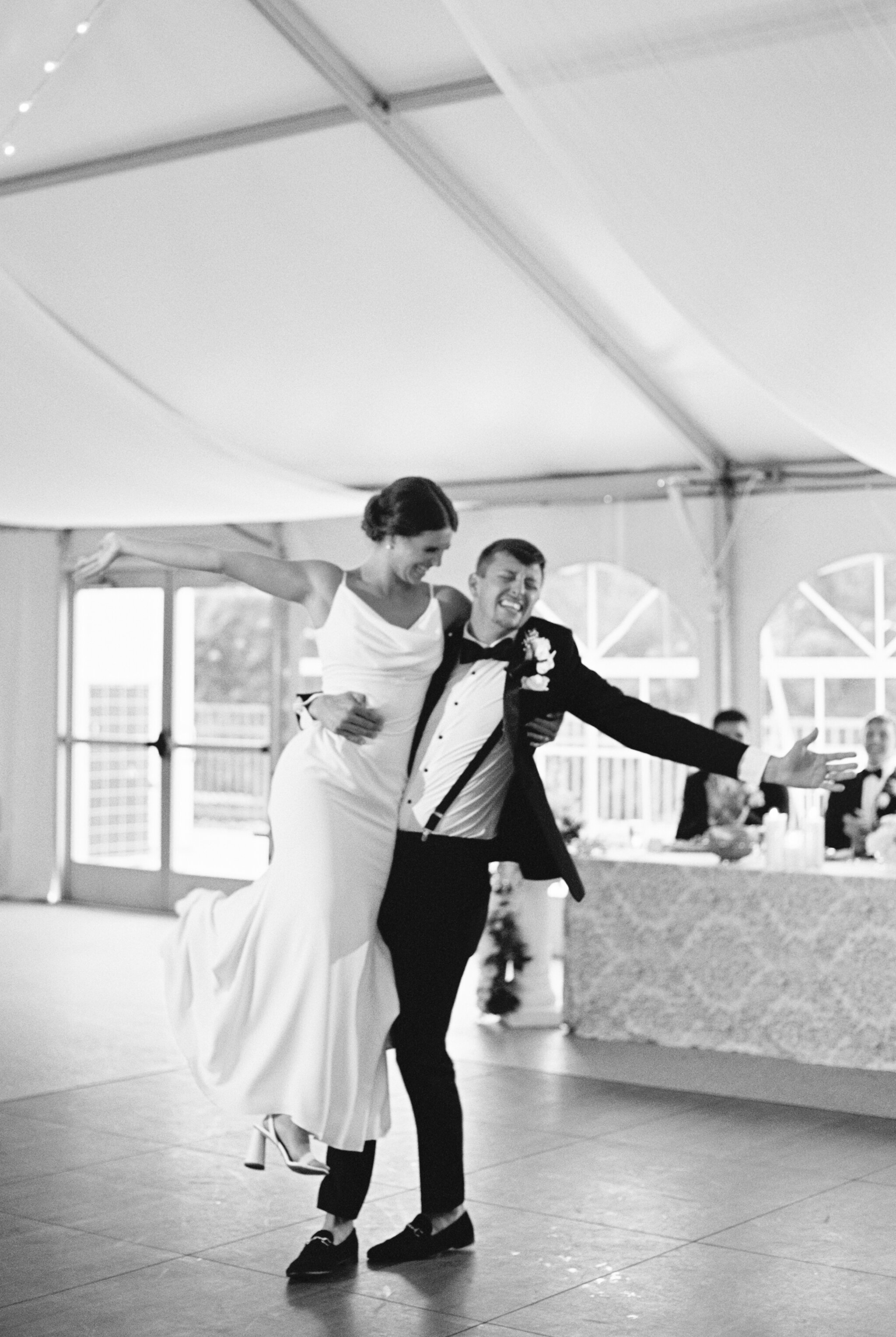 Rust Manor House Wedding | black and white film image of bride and groom sharing first dance