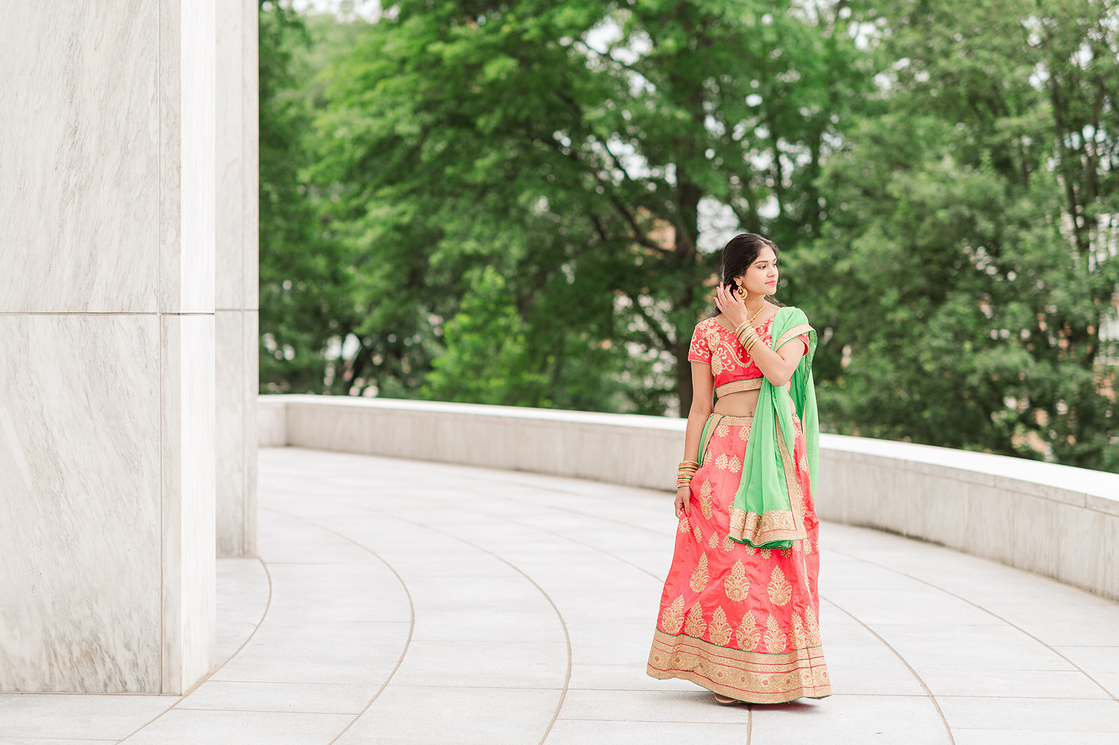 Senior girl, walking on the porch of founders Hall in Hershey, PA, by York PA photographer