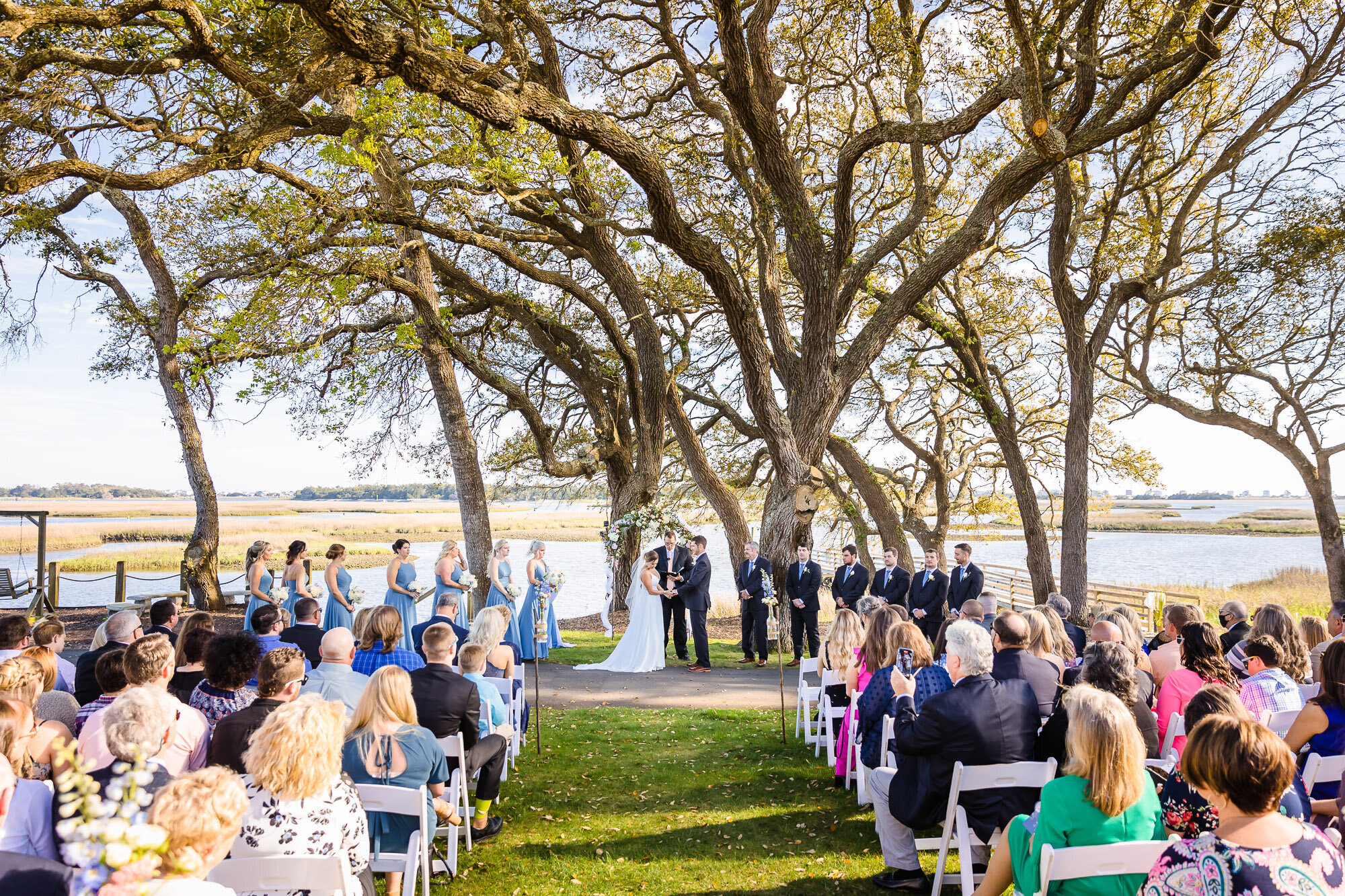 "wedding ceremony under trees in New Hanover county"
