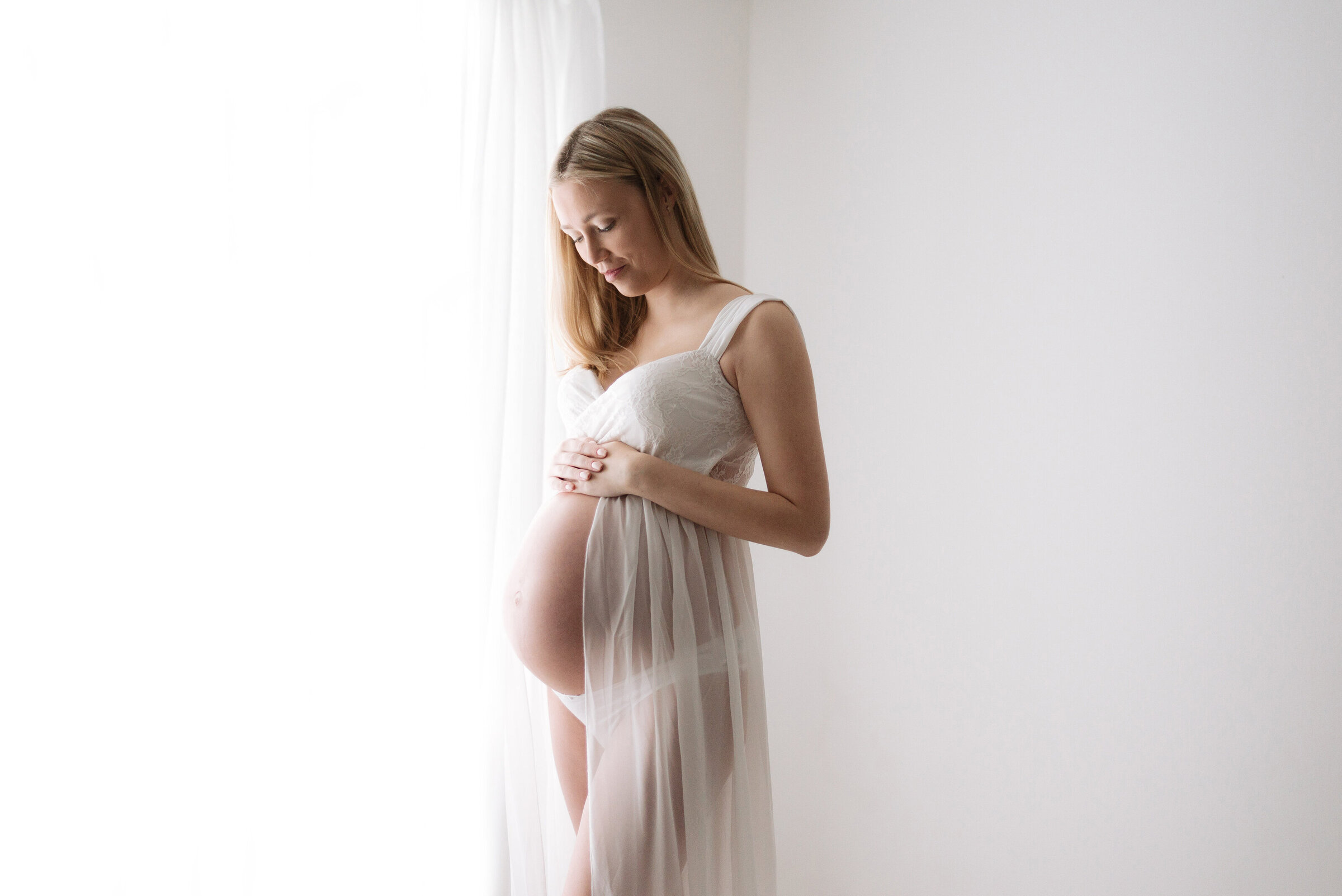 Pregnant mother at maternity photoshoot in Billingshurst