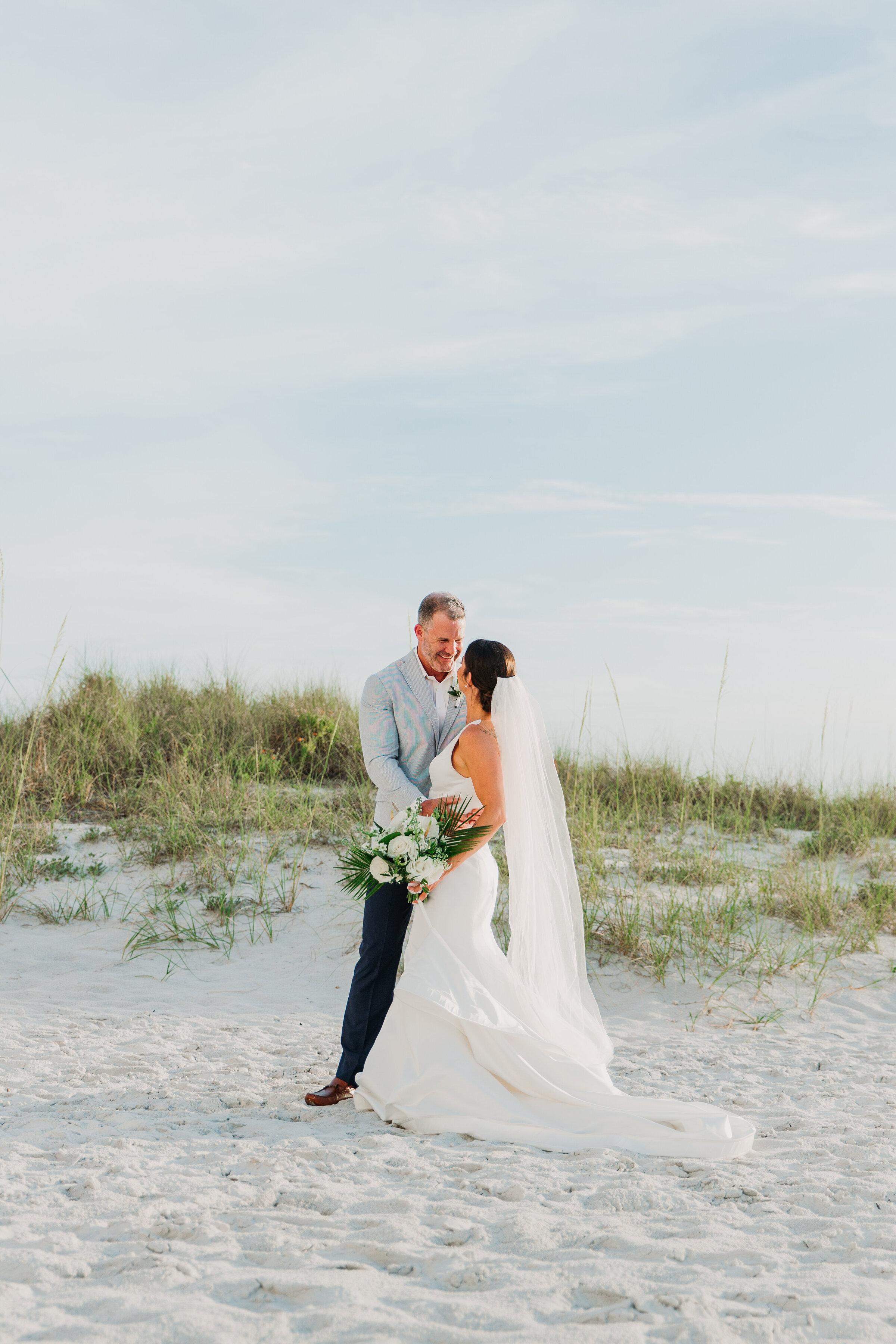 bride and groom at sandpearl resort in florida