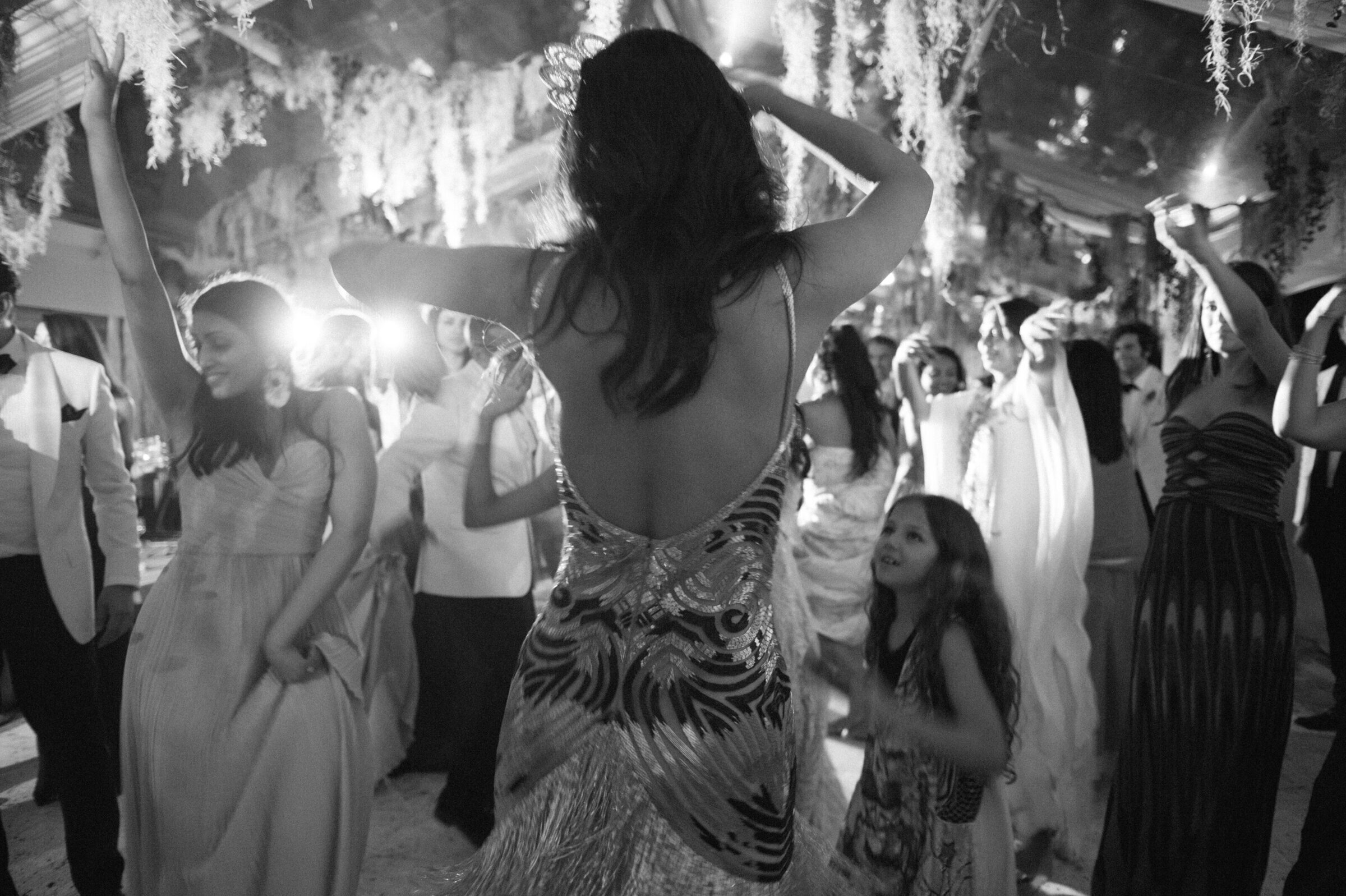 black and white photo of wedding reception dancing