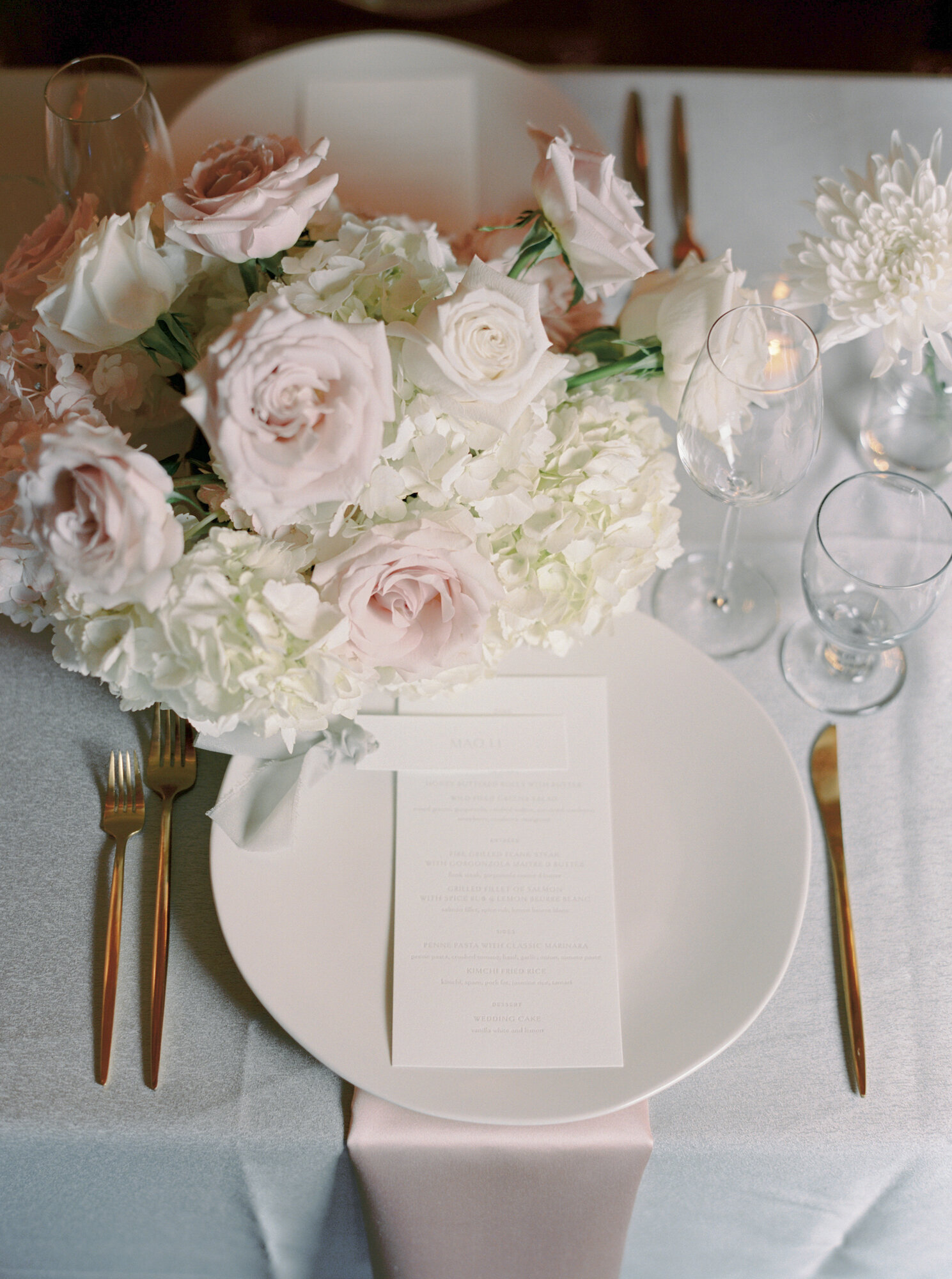 minimalist floral table-scape at wedding reception