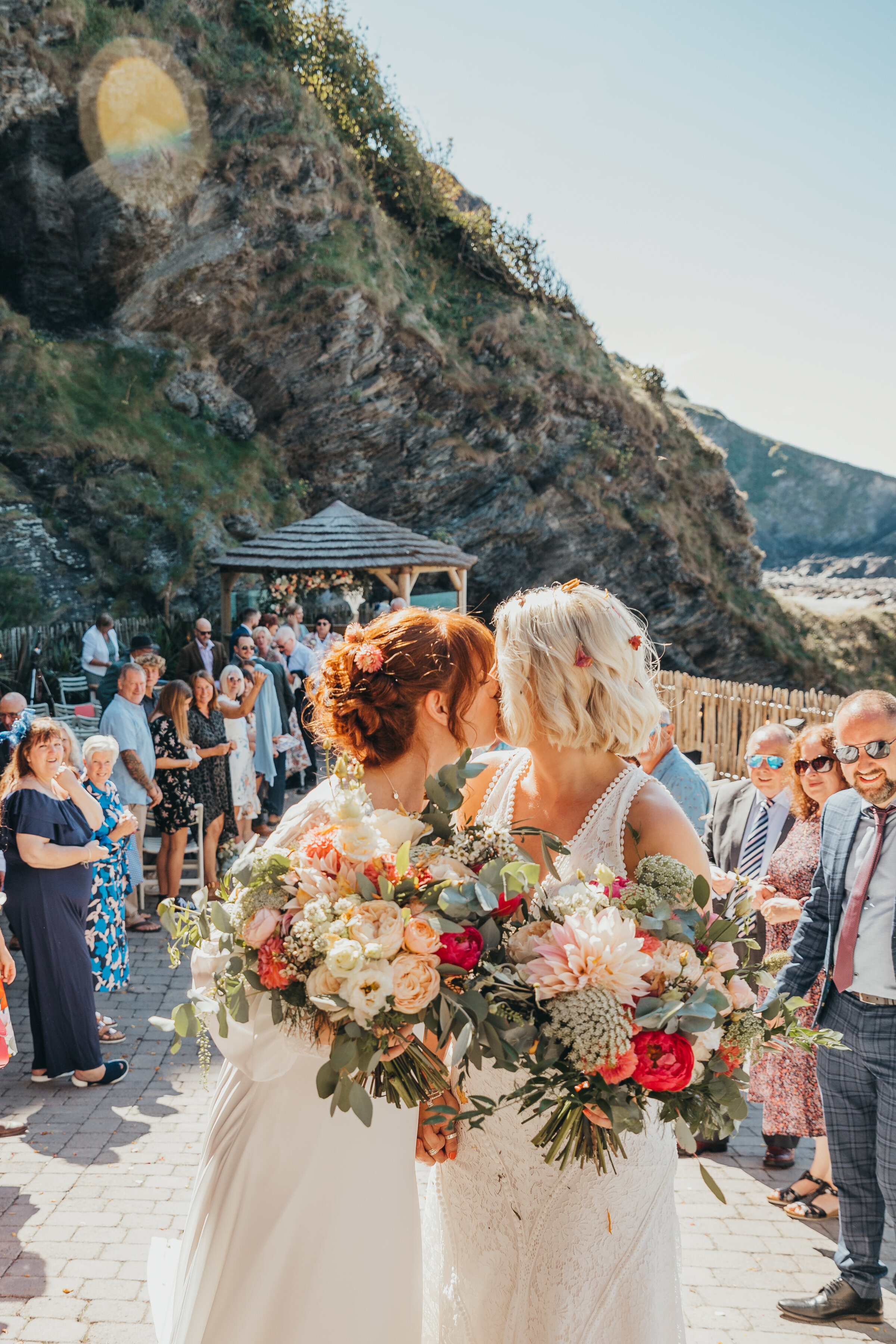 brides kiss after ceremony