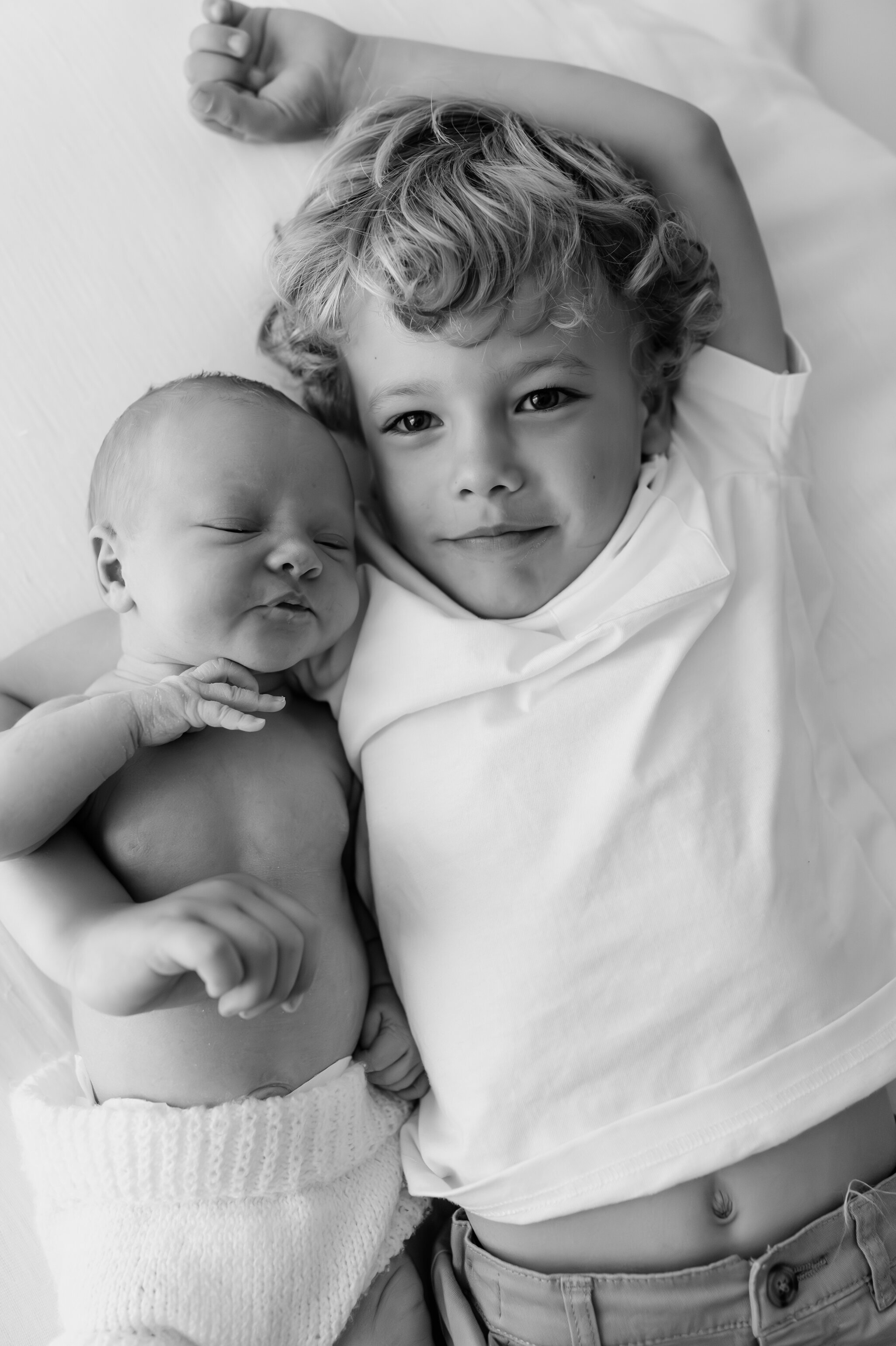 newborn girl, big brother and family at their newborn photography shoot in york, north yorkshire-50