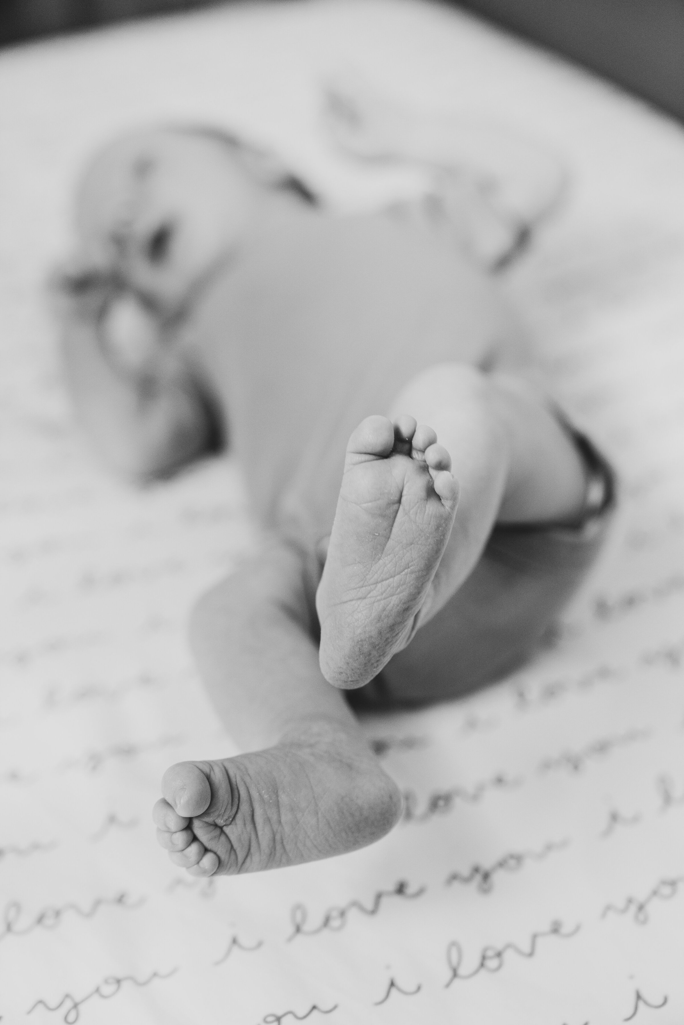 A photo of a baby's tiny feet