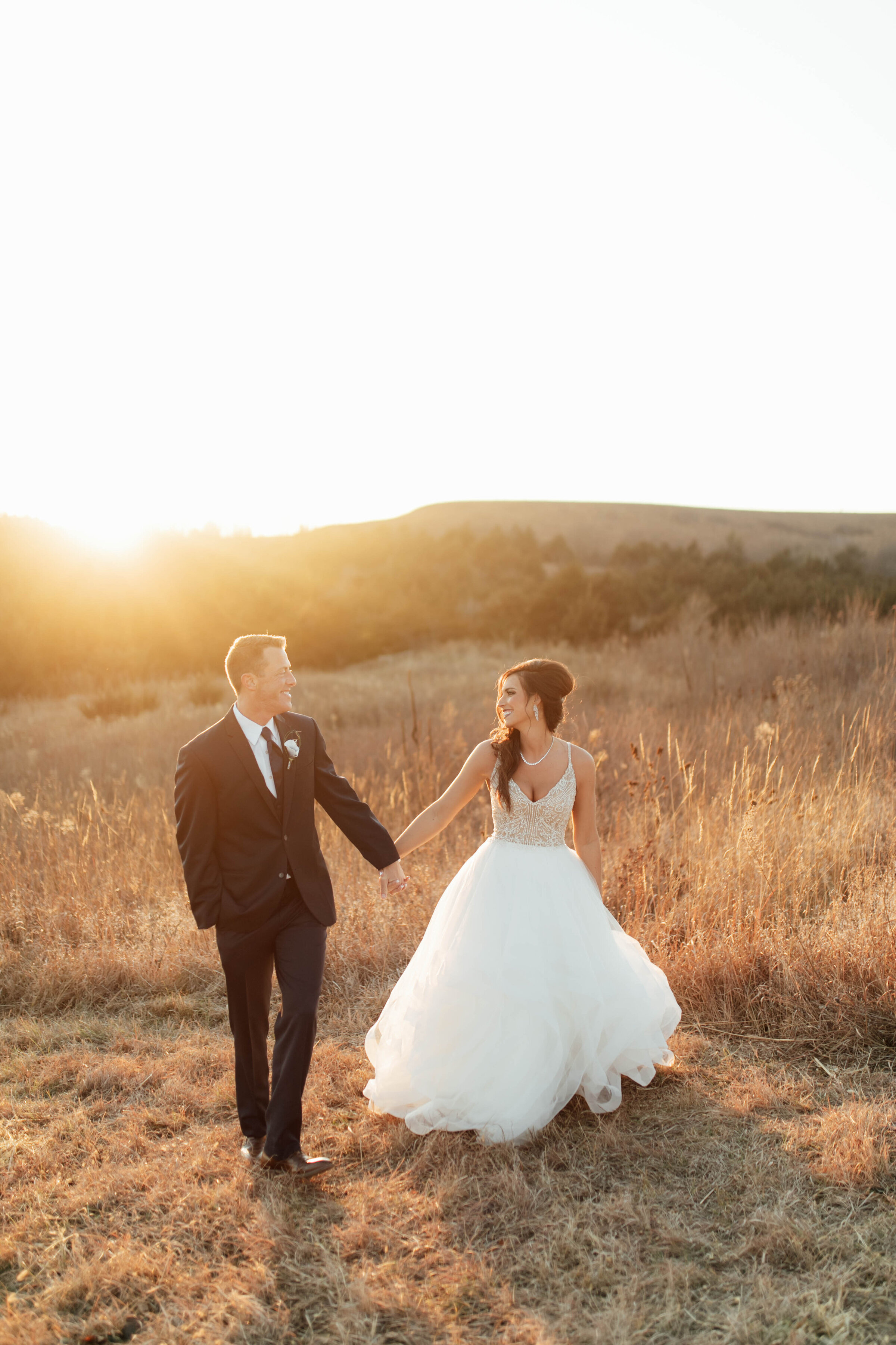 Golden hour portraits with bride and groom. 
