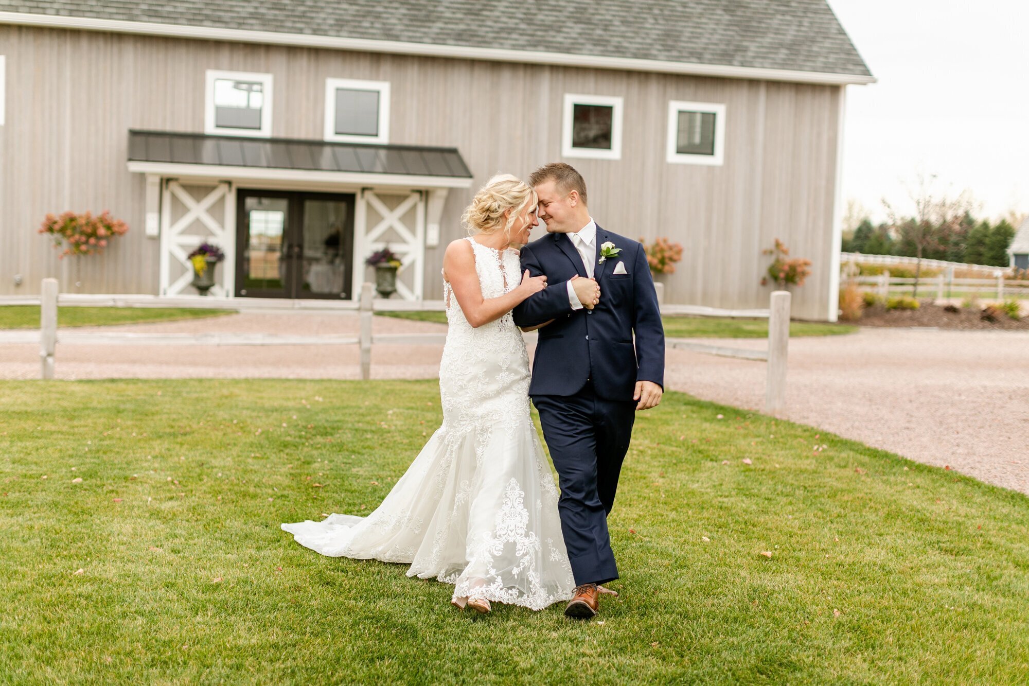 Bride and groom laughing and smiling at each other, taken by wedding photographer minneapolis

