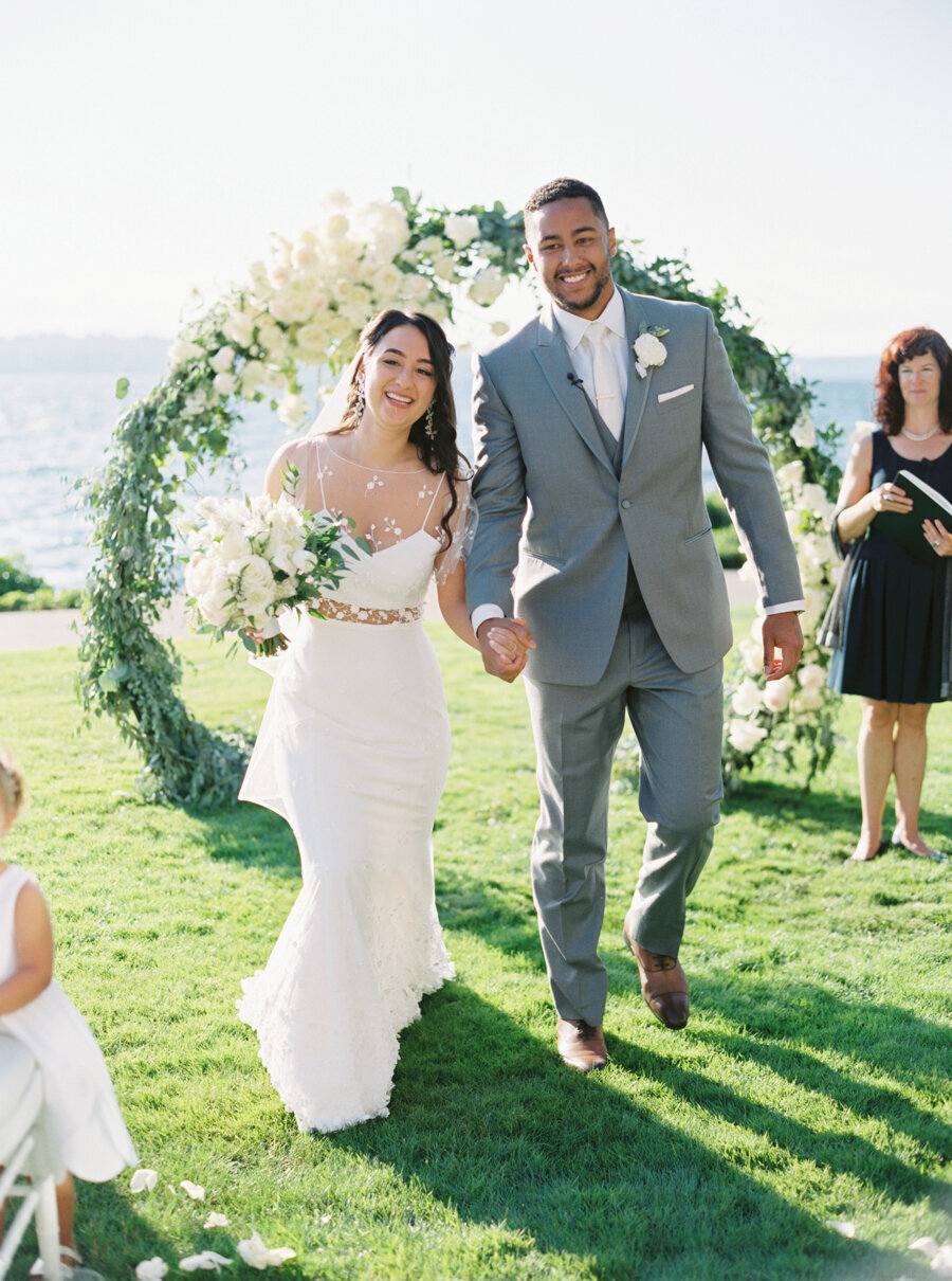 wedding processional bride and groom outside sunny