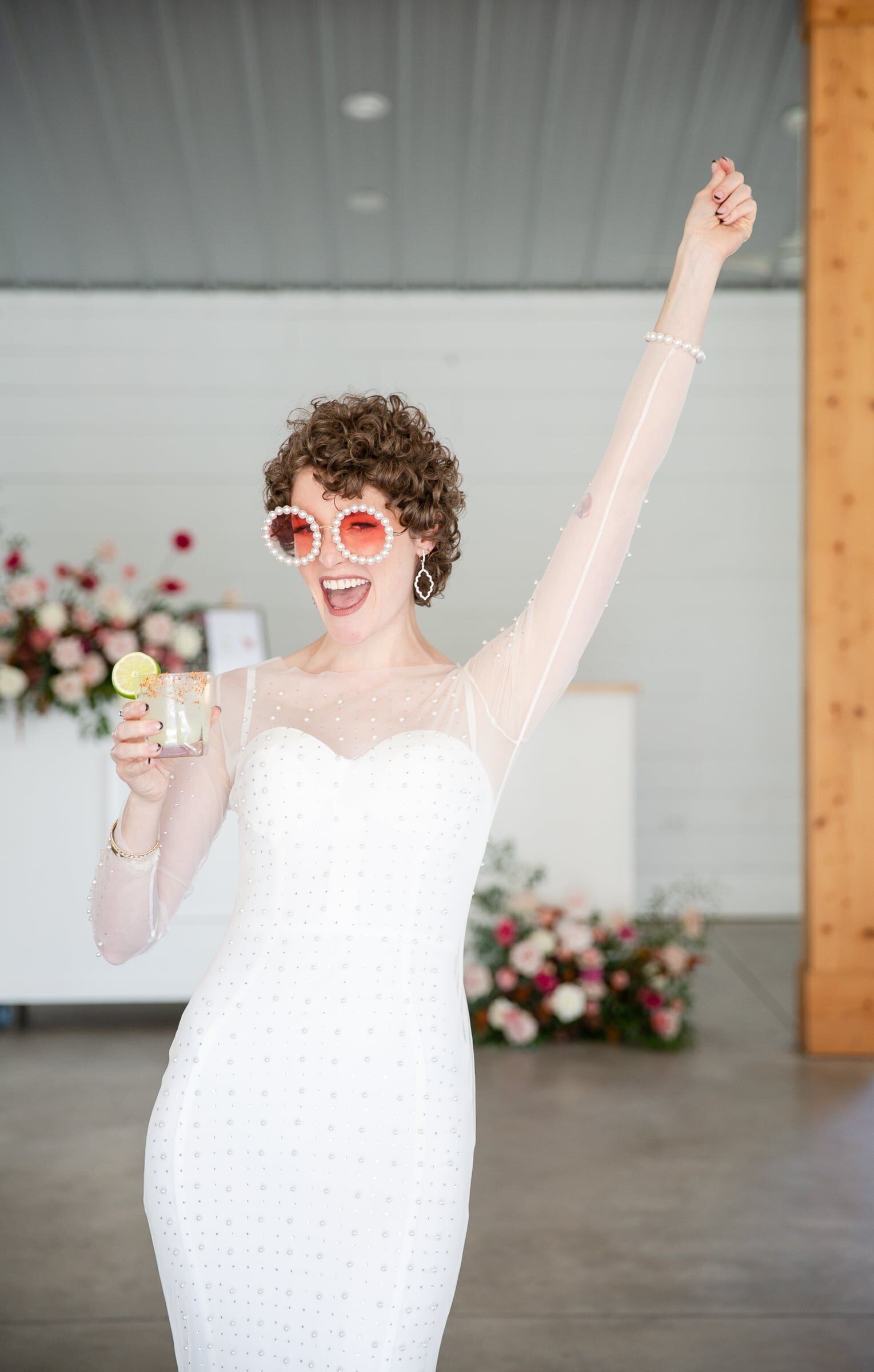 Bride holding her signature wedding drink at walnut hill  raleigh wedding. Walnut Hill wedding photographer.