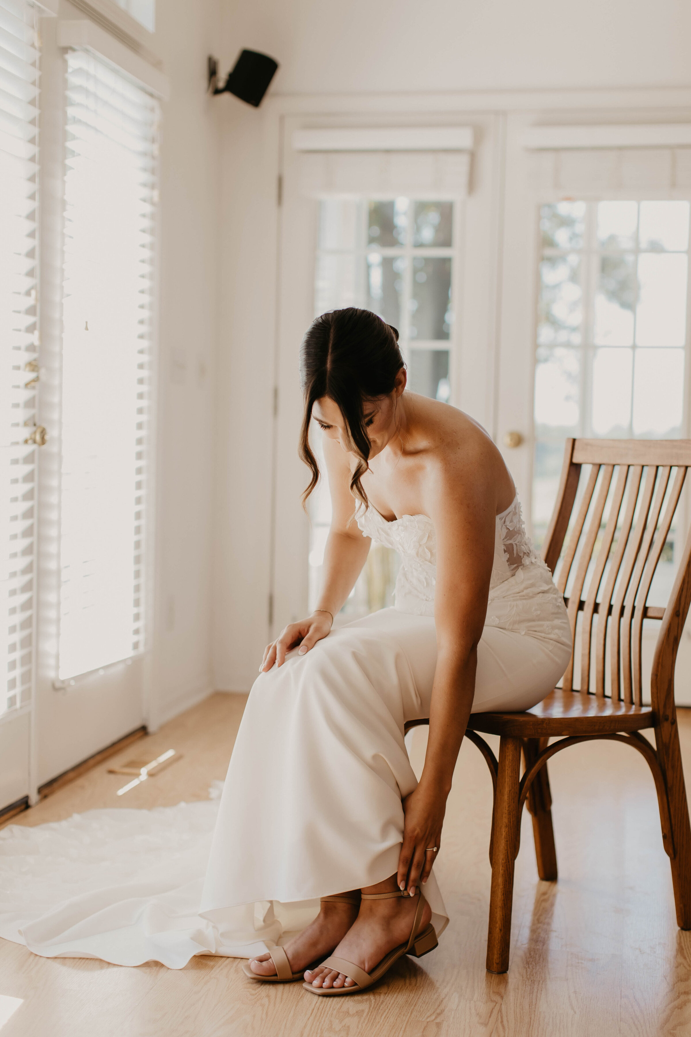 Bride putting on heels. 
