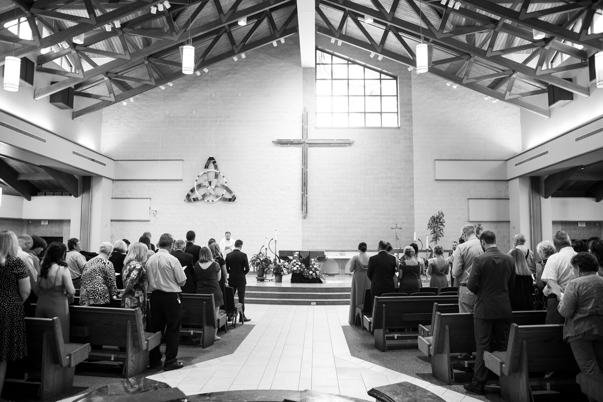 wide angle view of a wedding ceremony at Blessed Trinity in Frankenmuth, MI