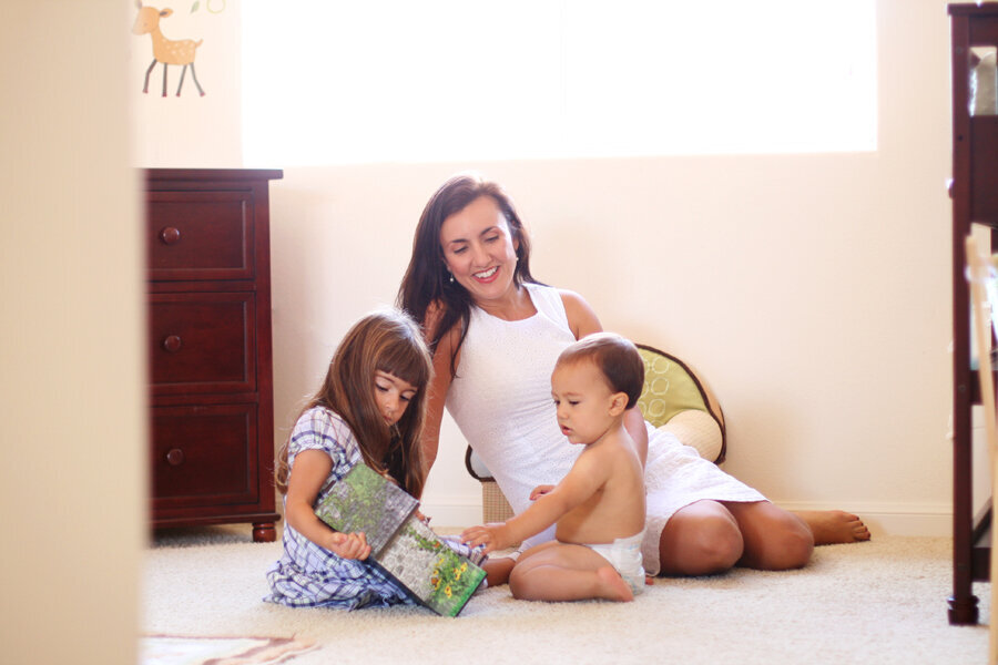Lifestyle family portrait with at home, natural light from window — San Francisco