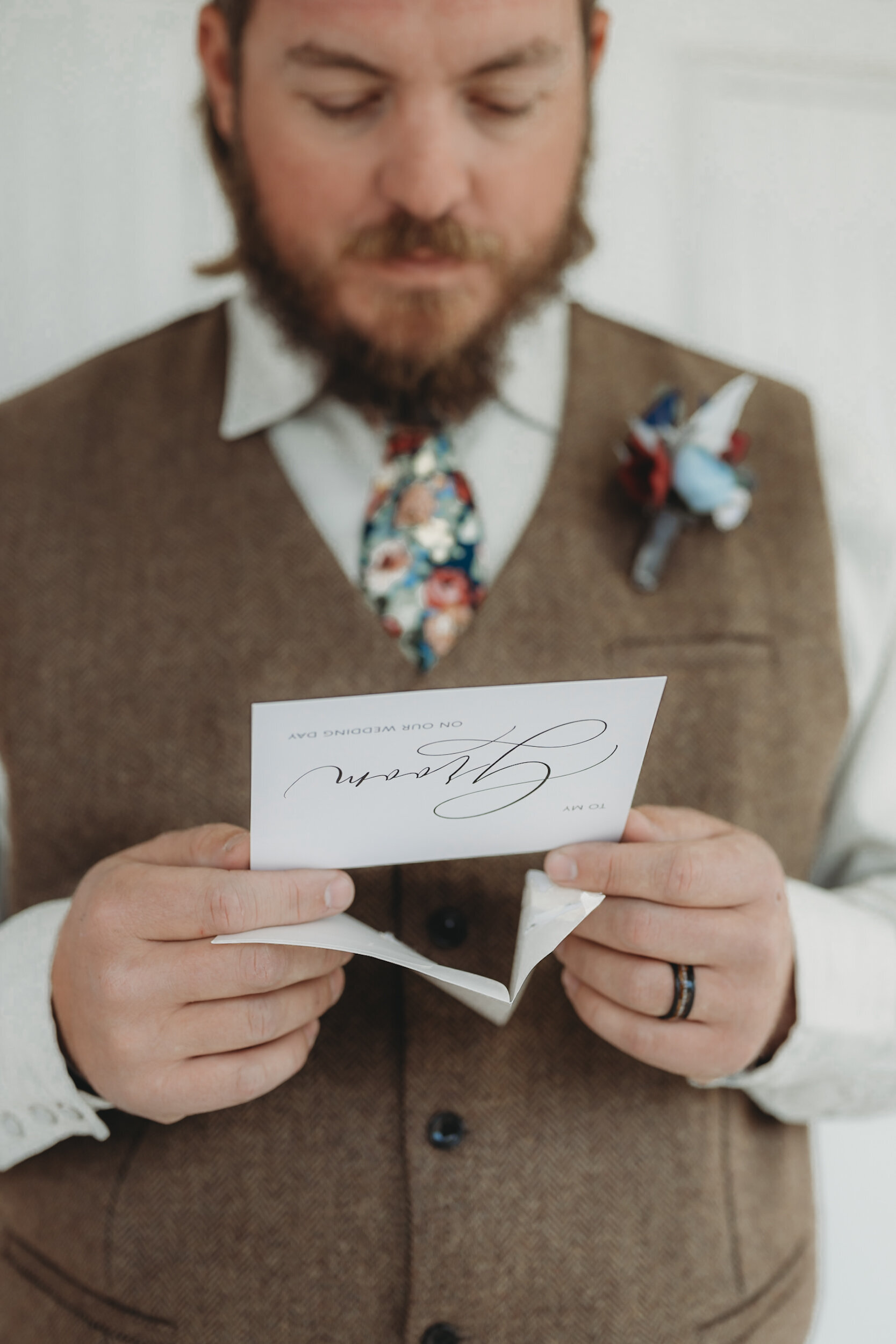 groom-reading-letter