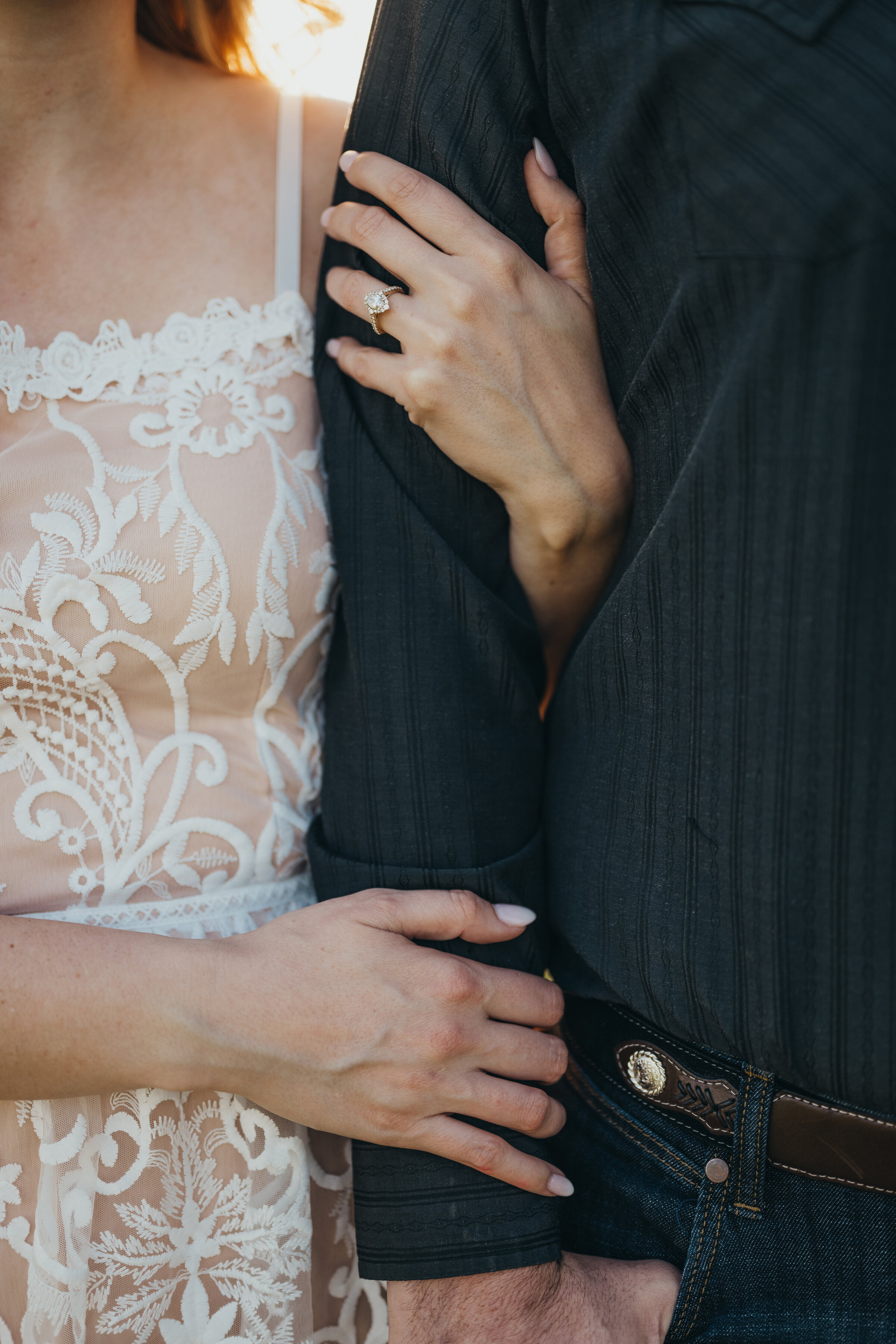 engagement-couple-holding-arm