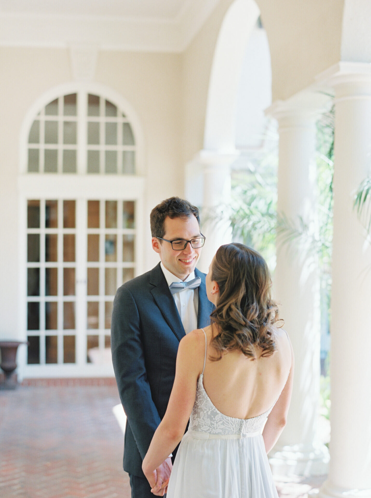 groom looking at bride for first look