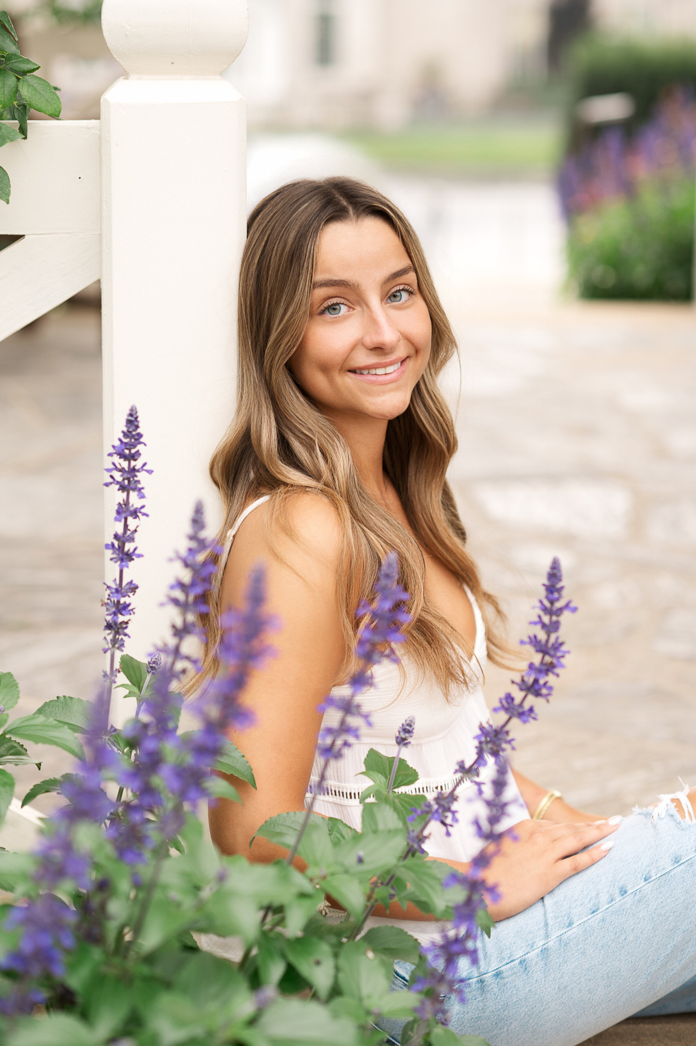 Senior girl smiling among lavender blooms at Hershey Gardens near York, Harrisburg, and Lancaster PA.