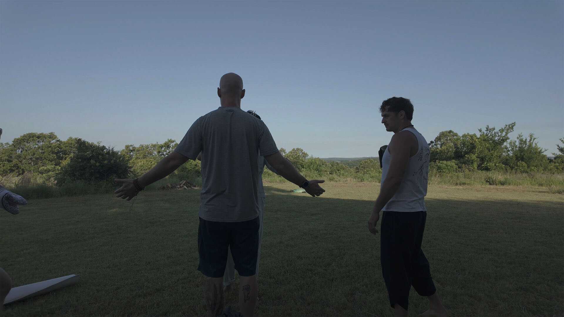 A photo of a veteran retreat participant receiving a smudging before events during a retreat.