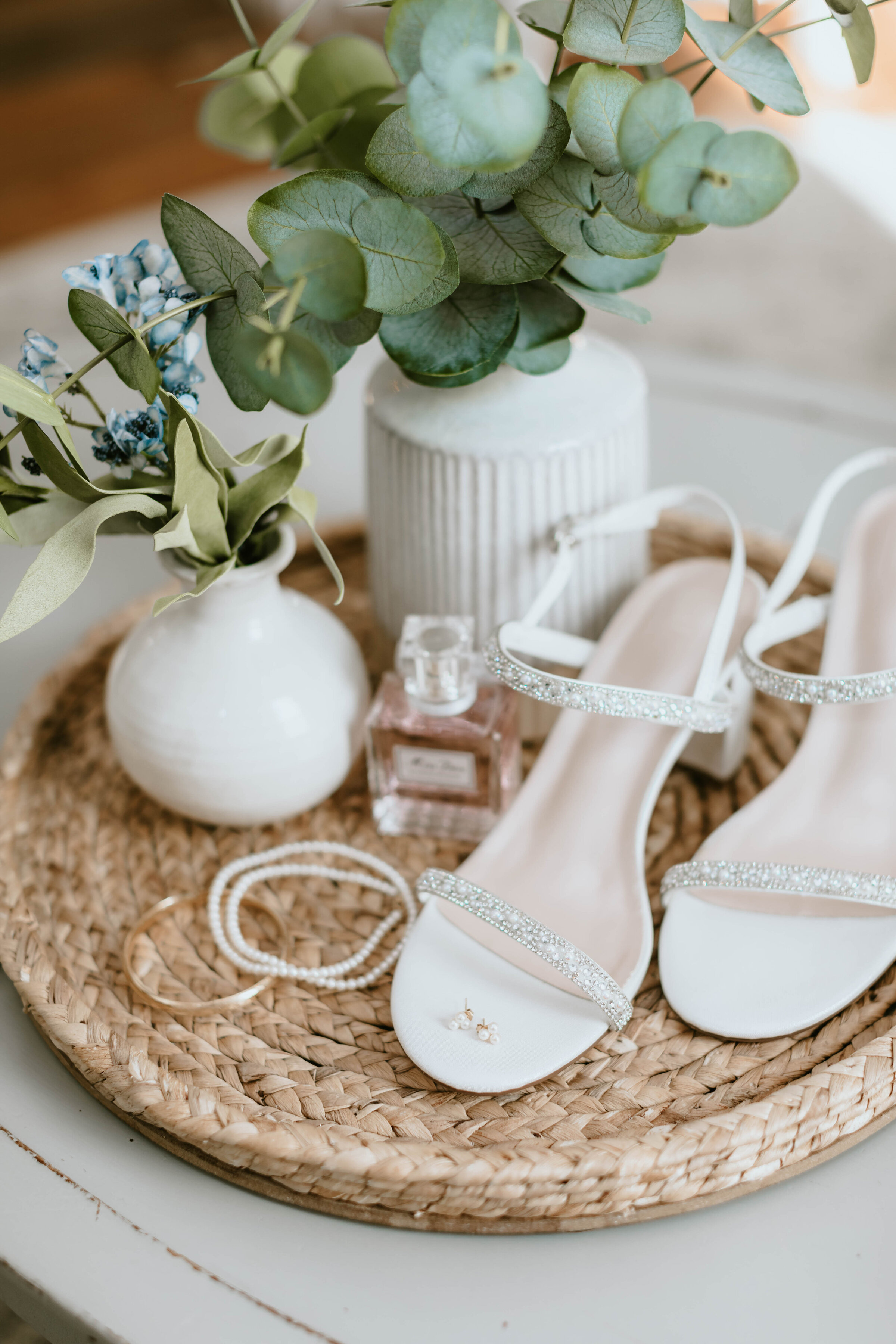 Bridal details with jewelry and shoes. 