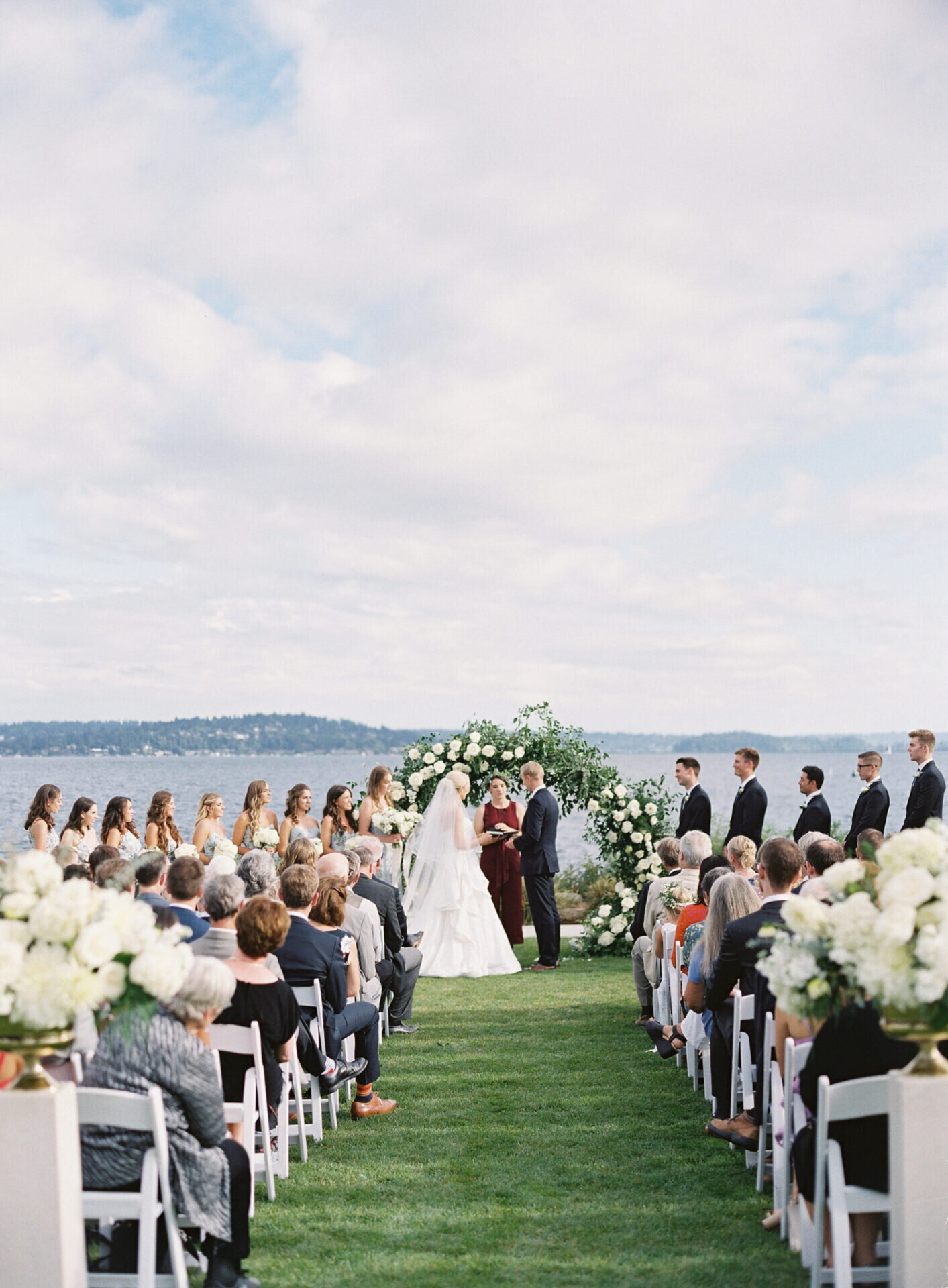film photo of wedding ceremony on the lake at seattle tennis club