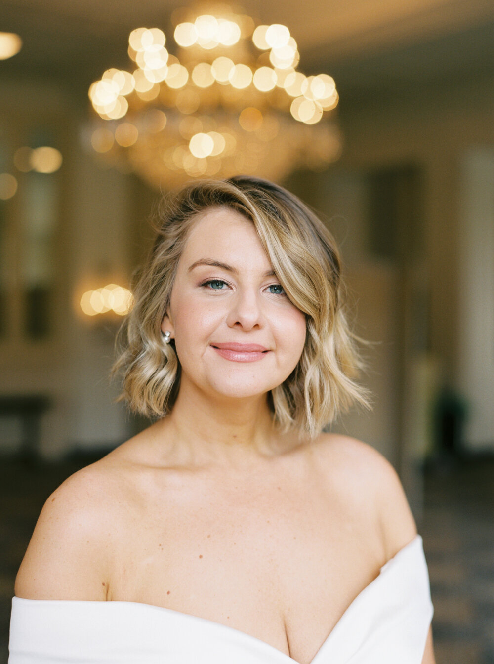 headshot portrait of bride on her wedding day indoors with natural light