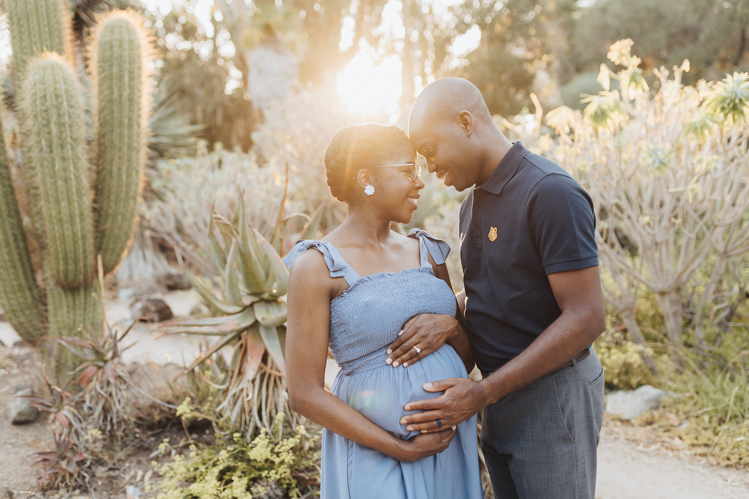Black couple embrace at Arizona Cactus Garden Emily Woodall Photography