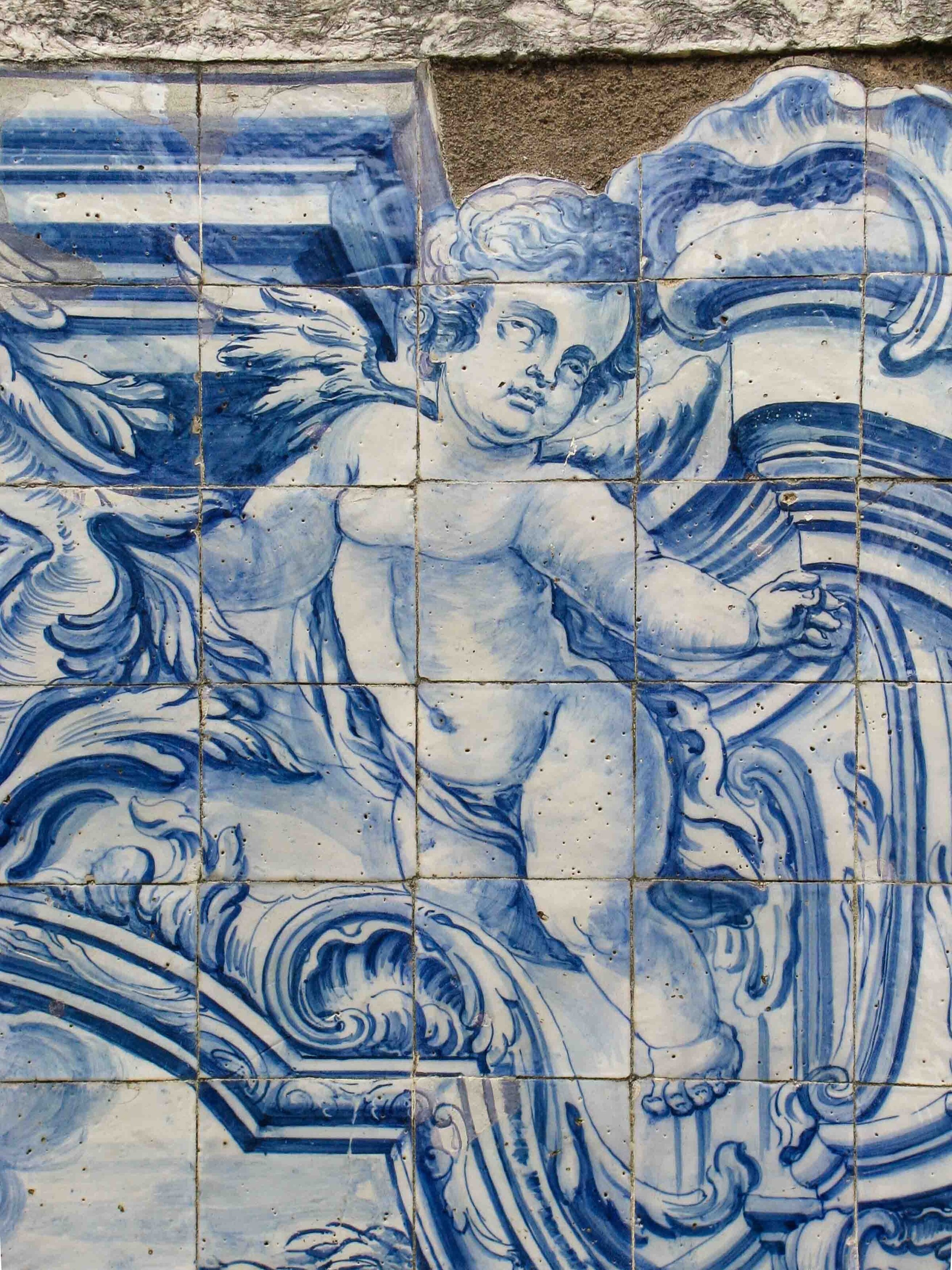 Detail of blue and white tiles depicting an angel in Lisbon, Portugal ©Stephanie Dosch | theViatrix Luxury Travel