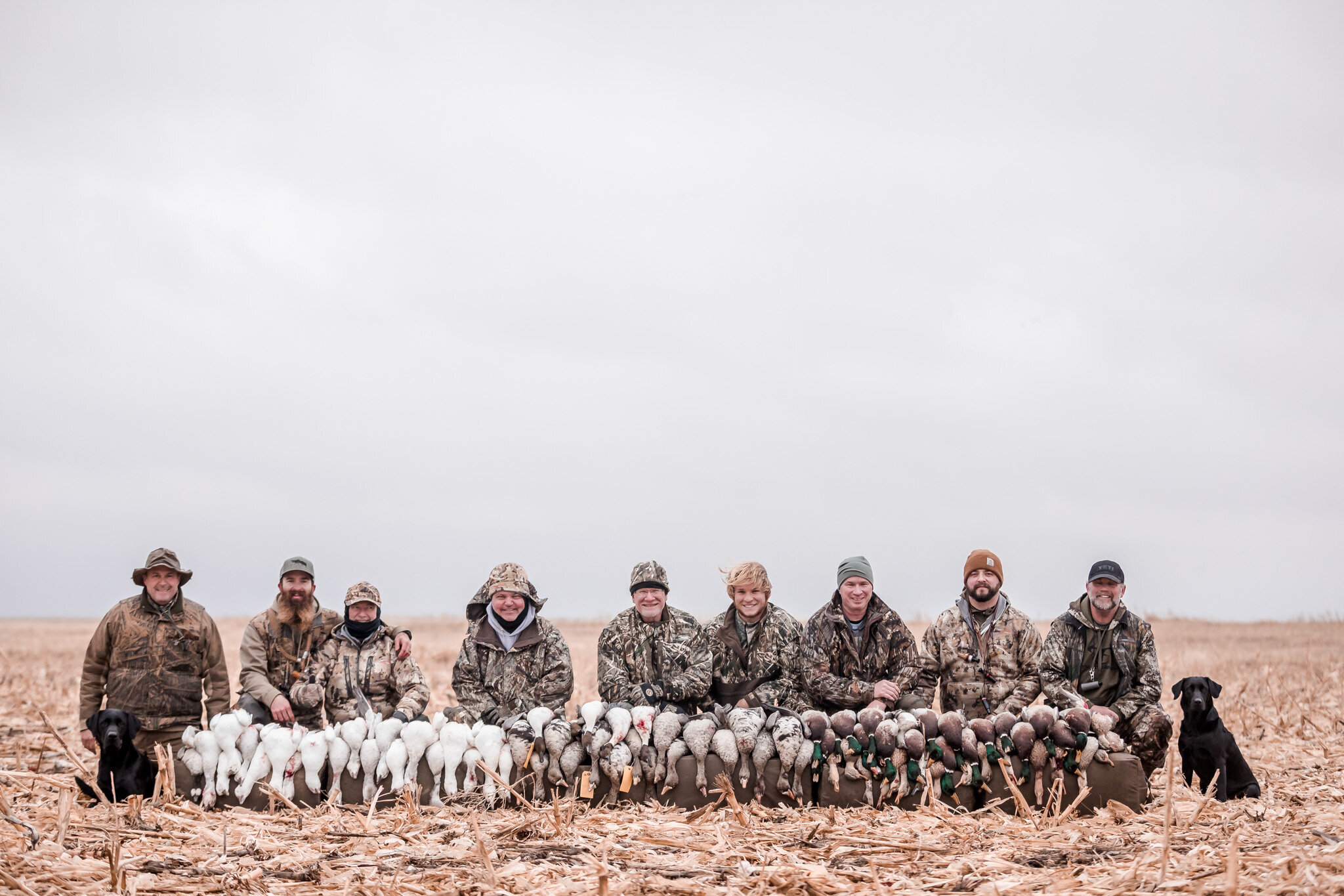 Kansas hunters with duck and geeses for a photo