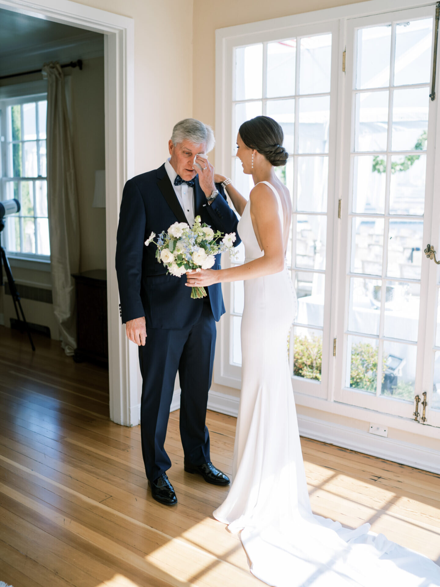 father of the bride emotionally crying at first look